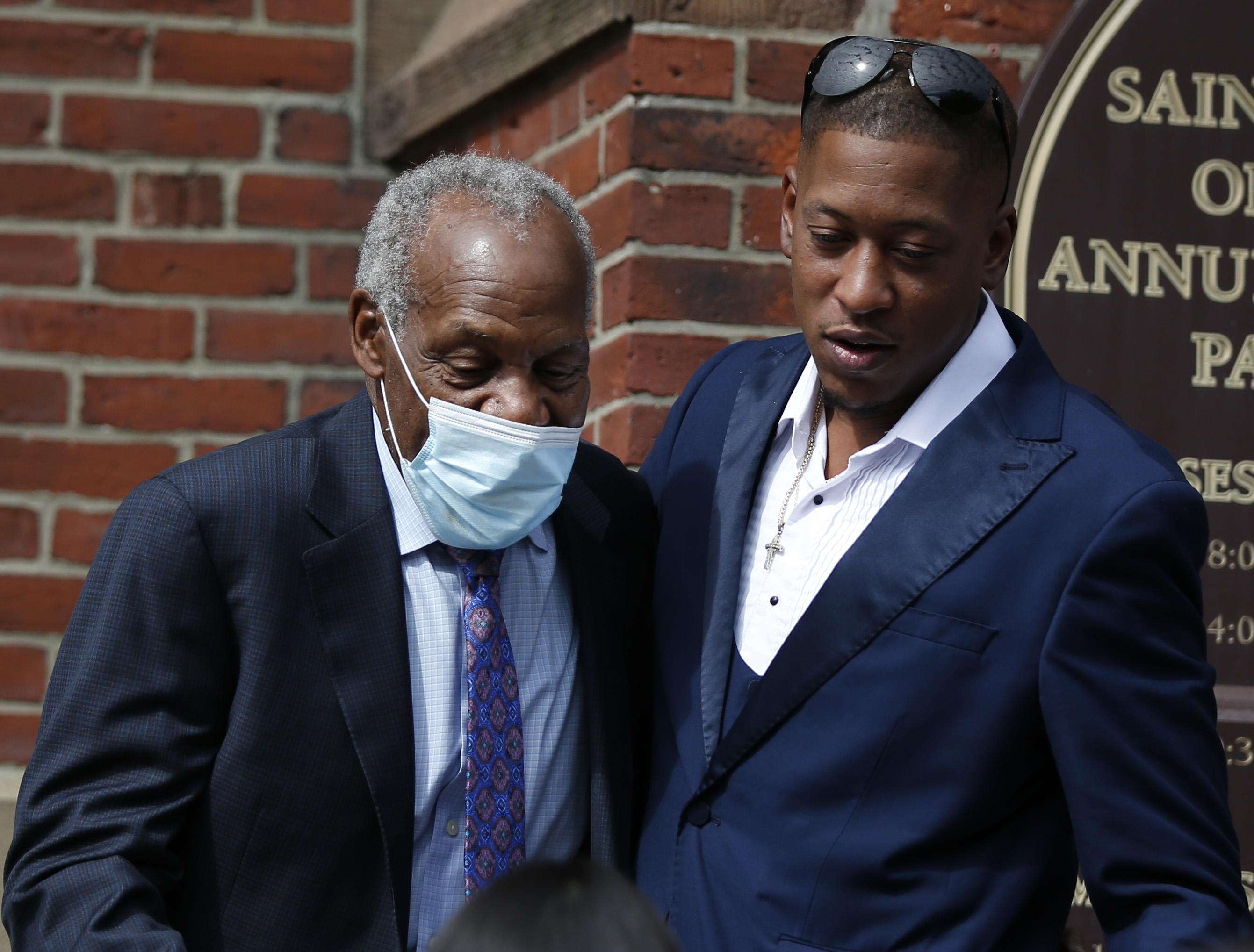 Actor Danny Glover, left, a board member of the Algebra Project, with Albert Sykes after the memorial.