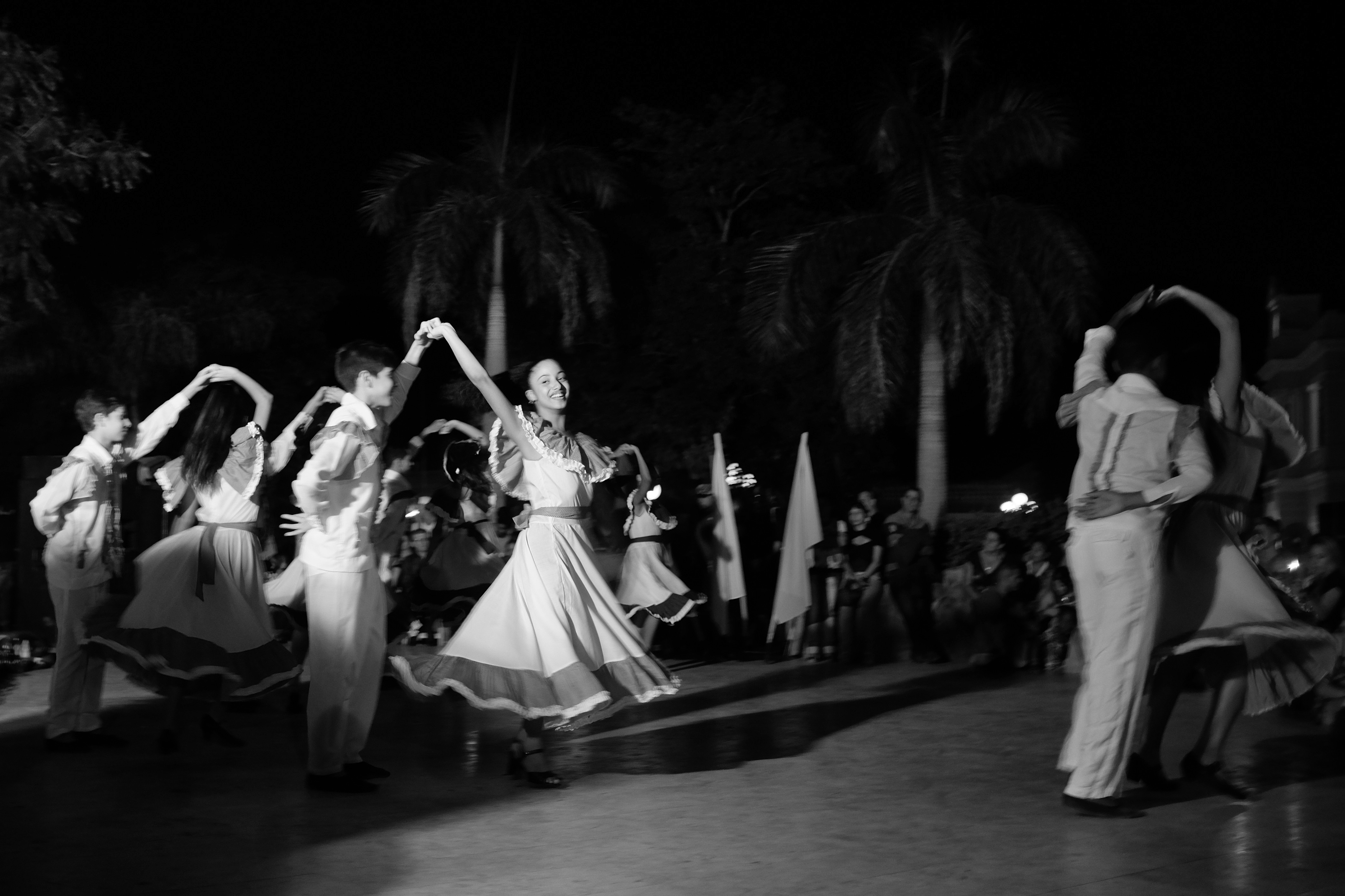Dancers celebrating Marcha de las Antorchas: A tribute to José Martí.