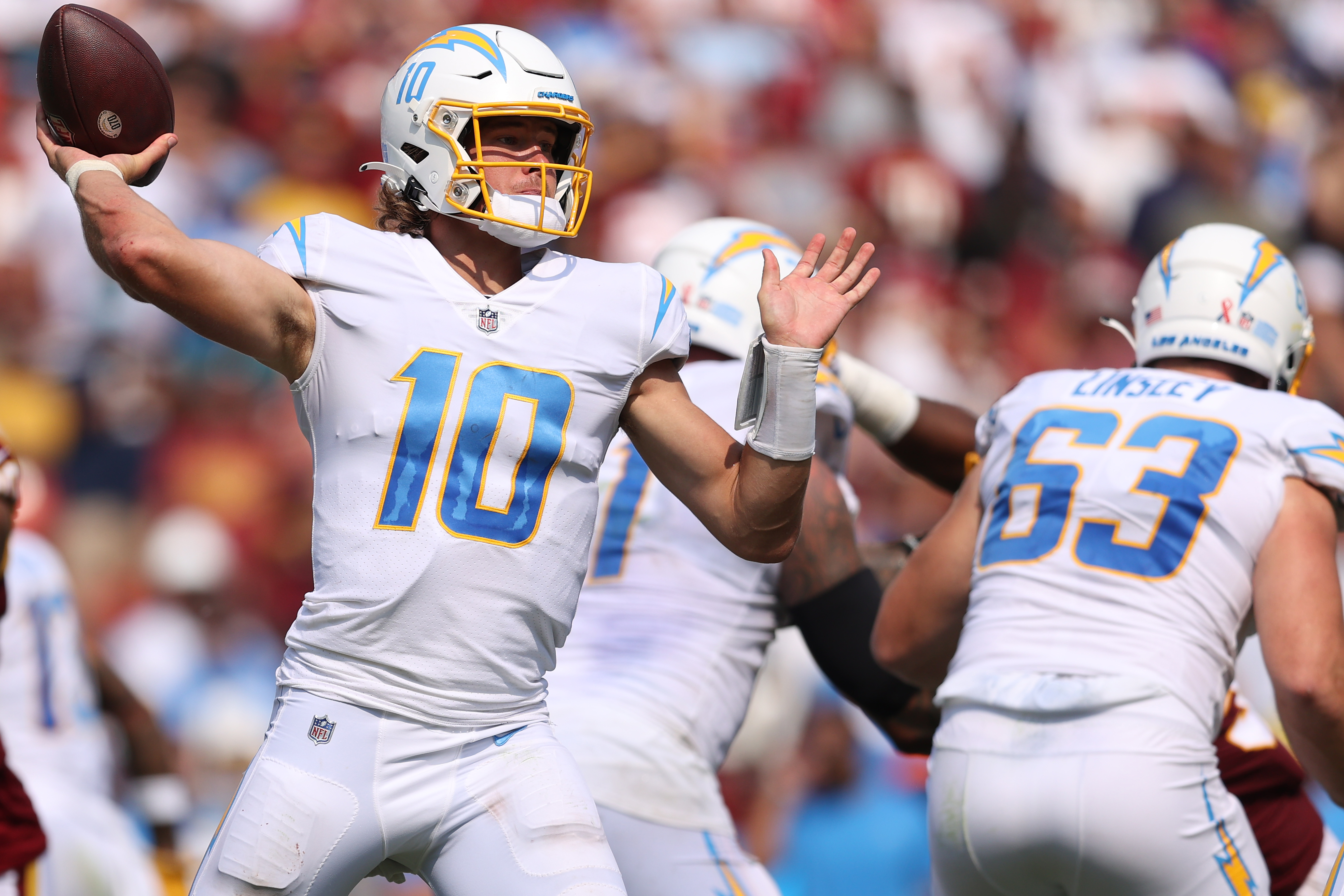 The Chargers' Justin Herbert was one of 11 quarterbacks to throw for at least 300 yards in Week 1.