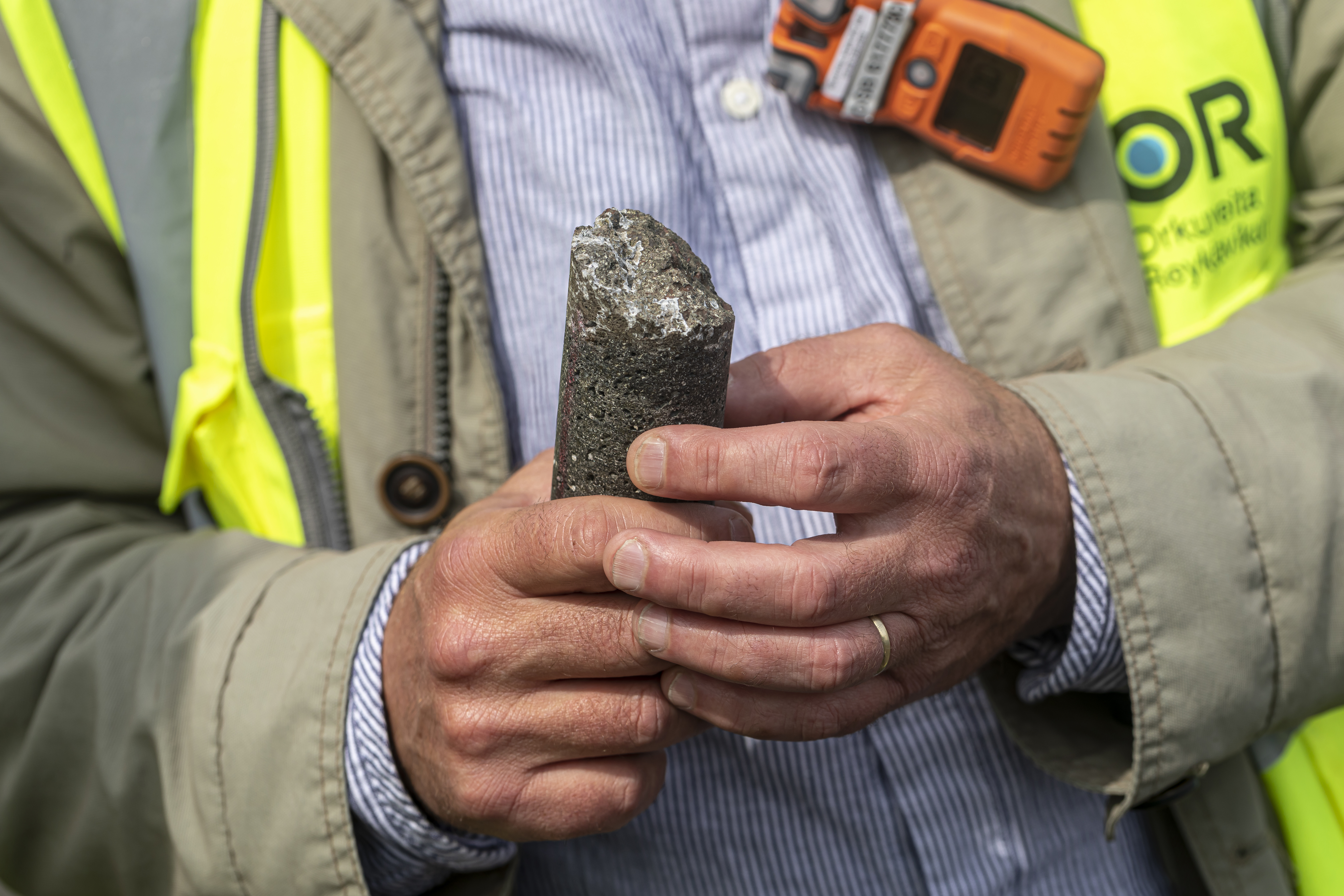 A piece of solid CO2 in the hands of Hellisheiði geothermal plant's communications manager Erikur Hjalmarsson.