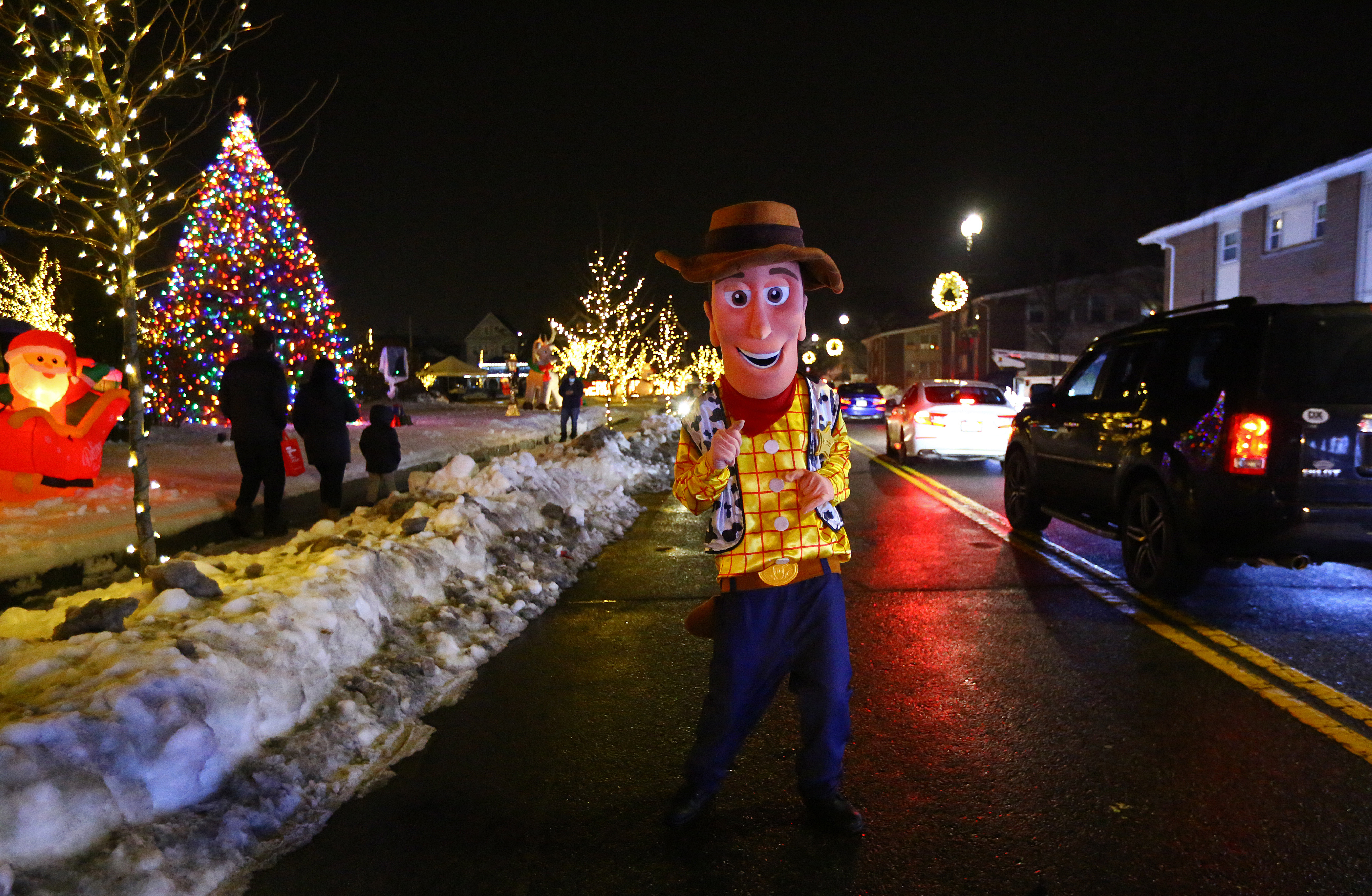Costumed characters greeted vehicle occupants at the Winter Wonderland drive-thru around Wehner Park in Everett.