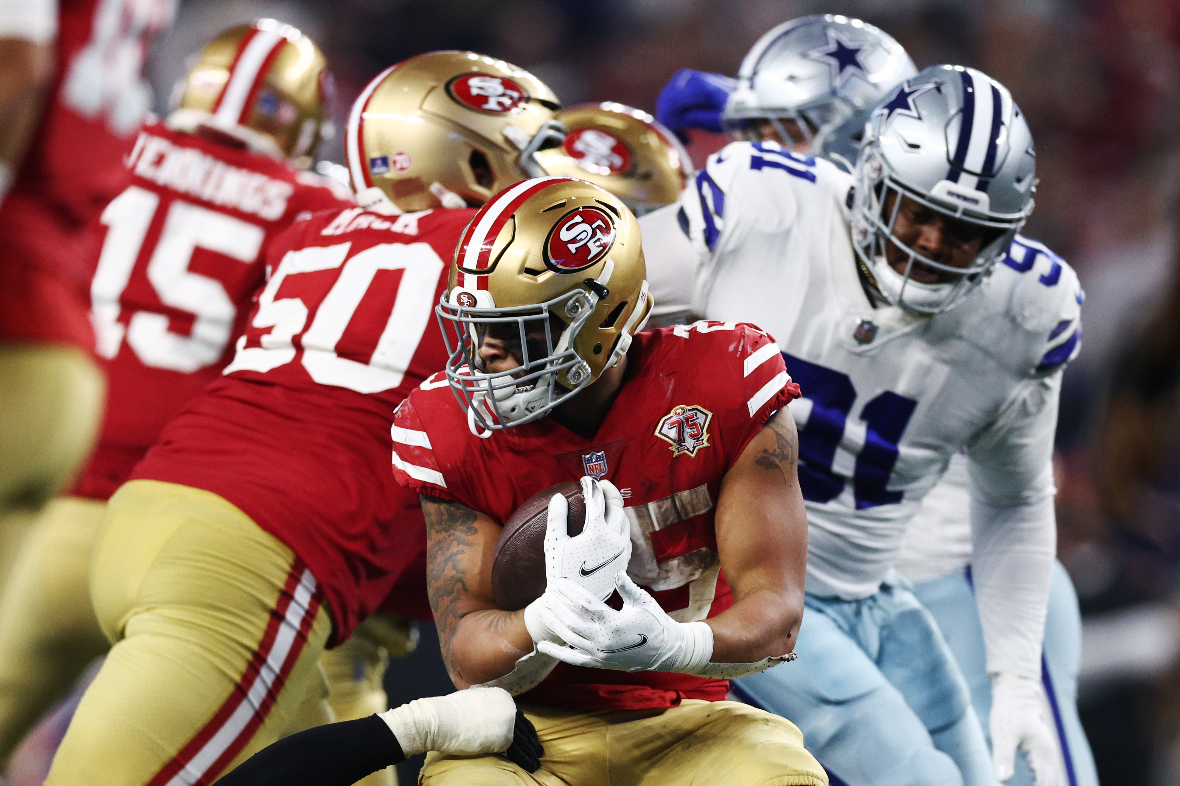 49ers hang on over Cowboys 23-17 in chaotic wild-card finish