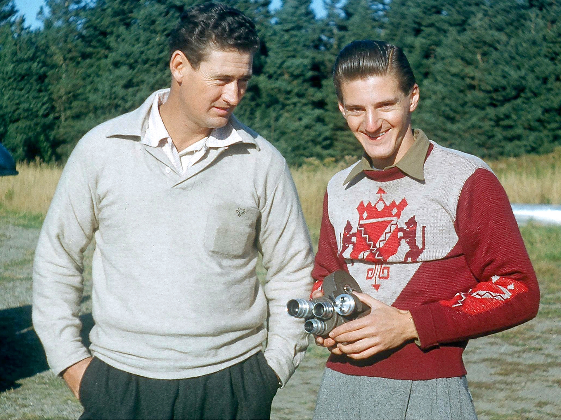 Ted Williams gives fishing lesson to little boy - Digital Commonwealth