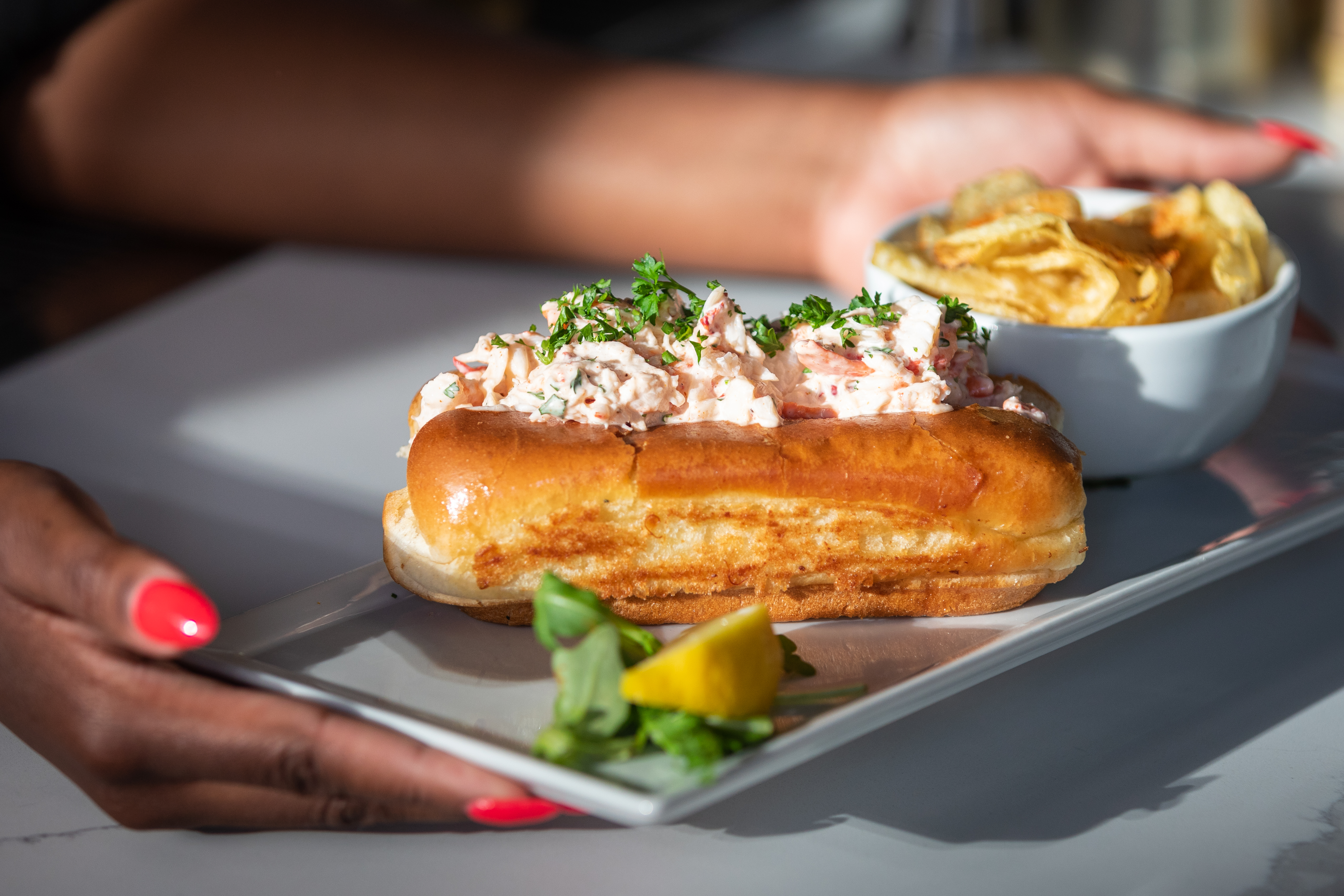 The lobster roll served at The Pearl seafood restaurant in Boston.