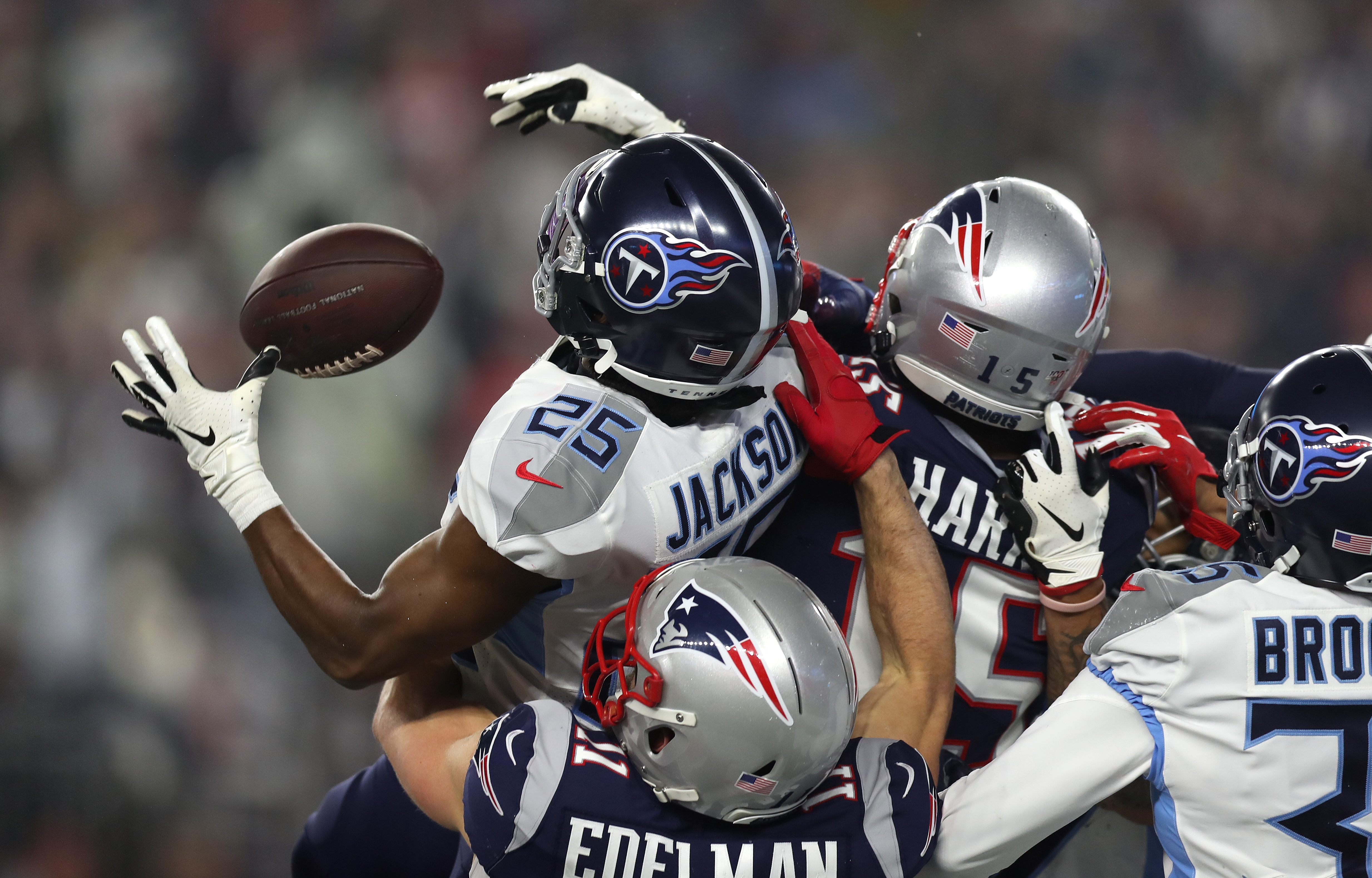 Titans defenders broke up this deep pass from Tom Brady during the second quarter of the AFC Wild Card game at Gillette Stadium on January 4.