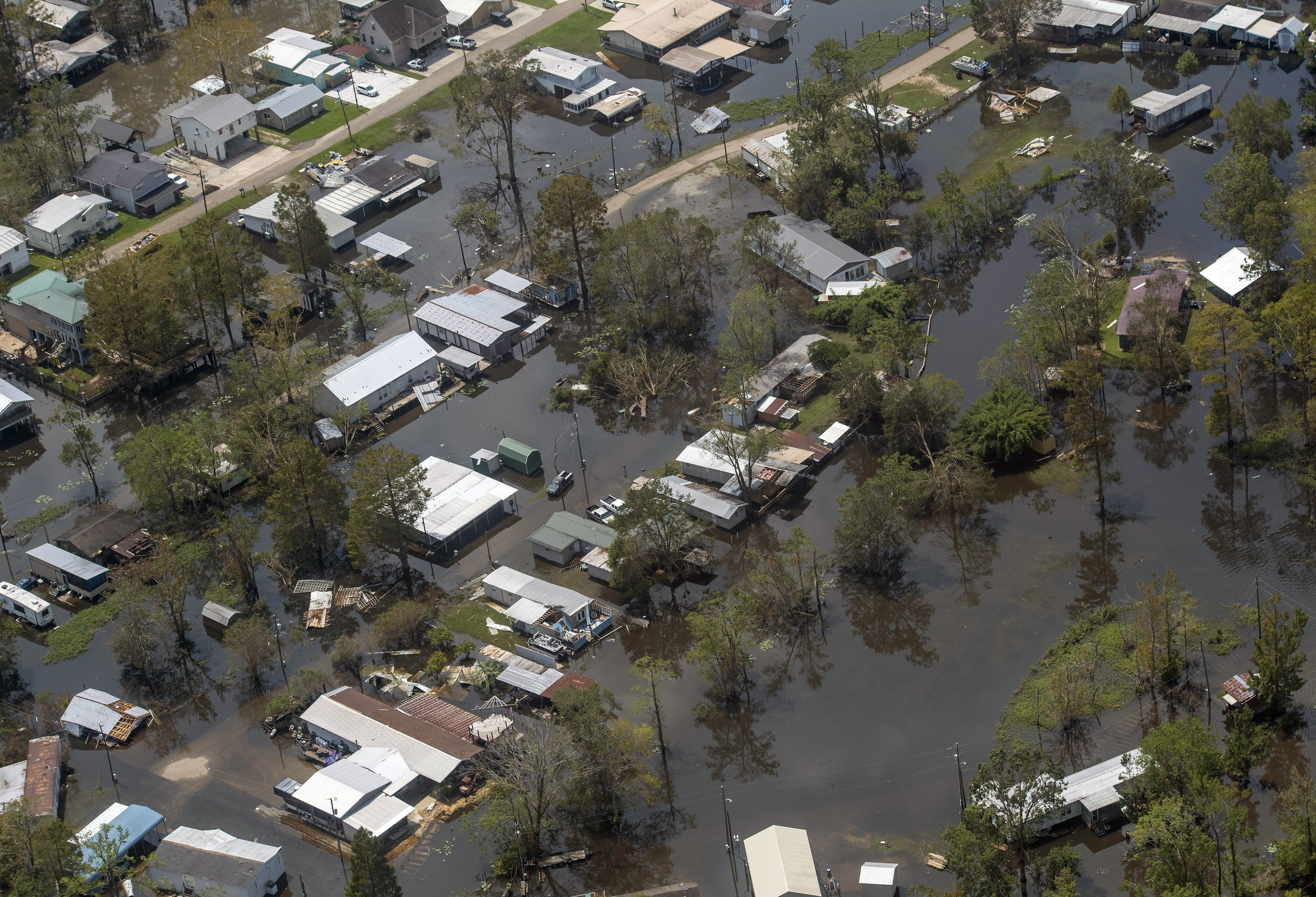 Flooding in French Settlement, La., is viewed Thursday Sept. 2, 2021, as Gov. John Bel Edwards took an aerial tour to assess Hurricane Ida damage and meet with local officials.