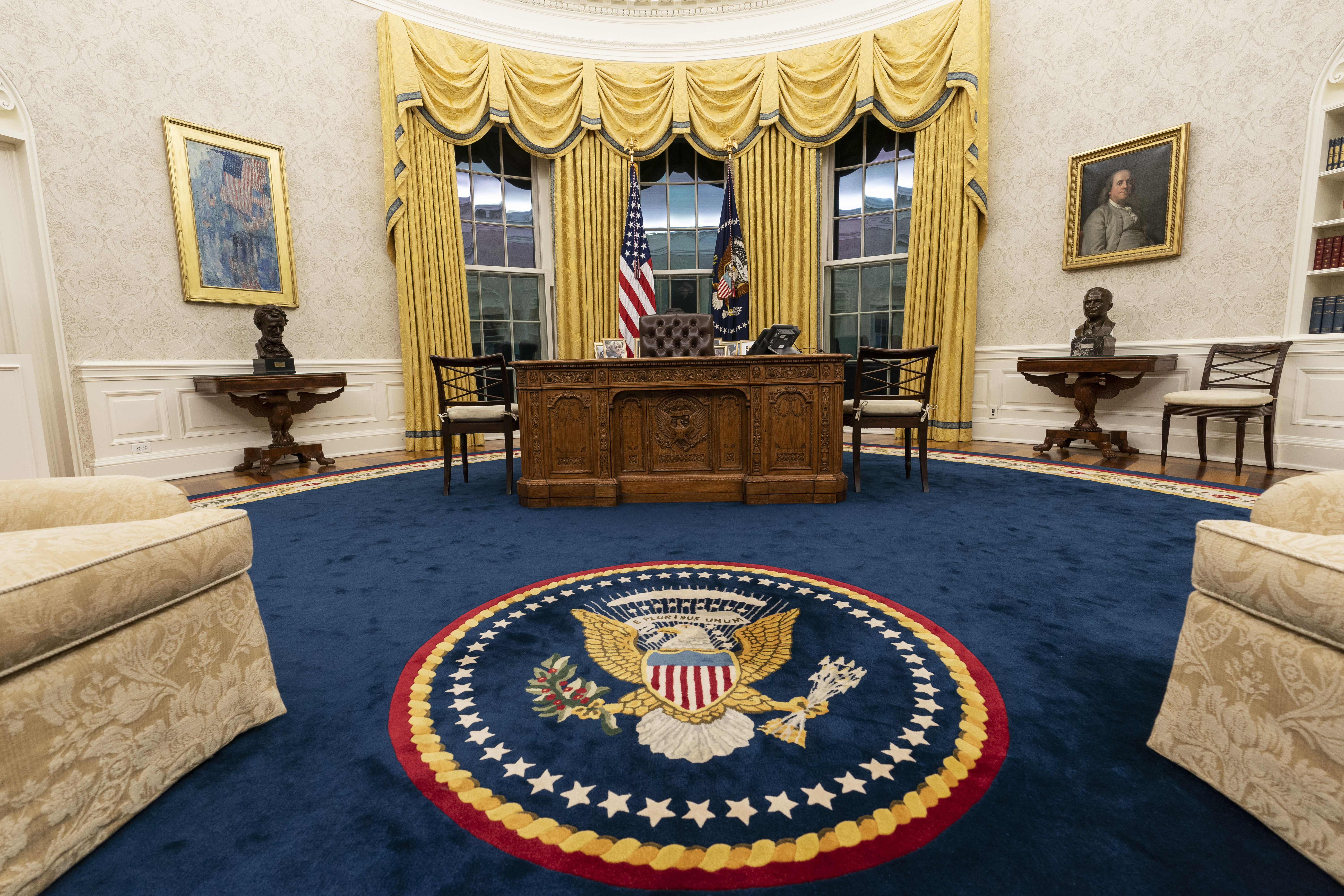 The Oval Office of the White House is newly redecorated for the first day of President Joe Biden's administration.
