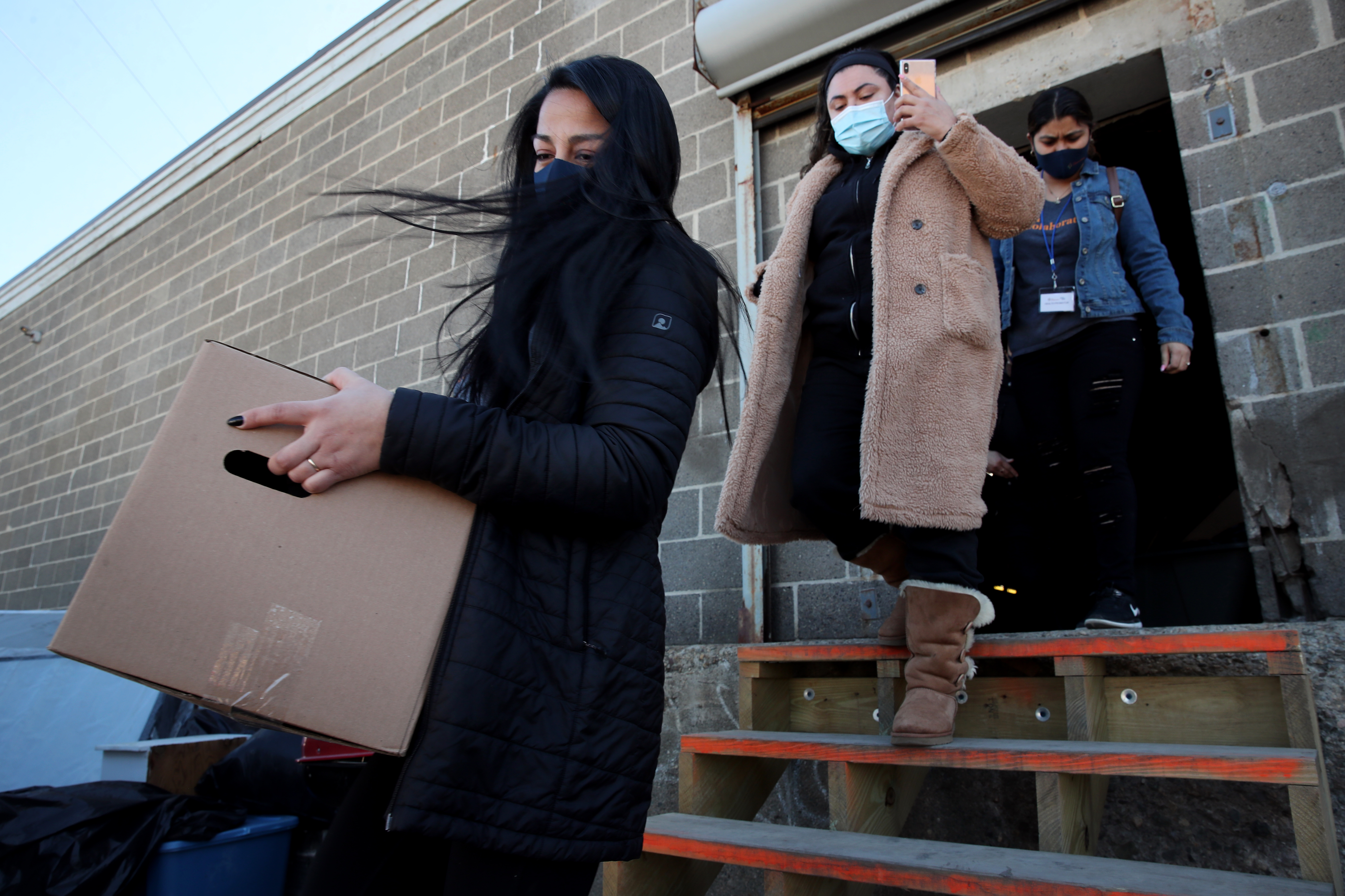 Cynthia Torres and other La Colaborativa staff members and volunteer doctors went door-knocking in Chelsea's hardest-hit neighborhoods to educate residents about the COVID-19 vaccines and help them address their many urgent needs.
