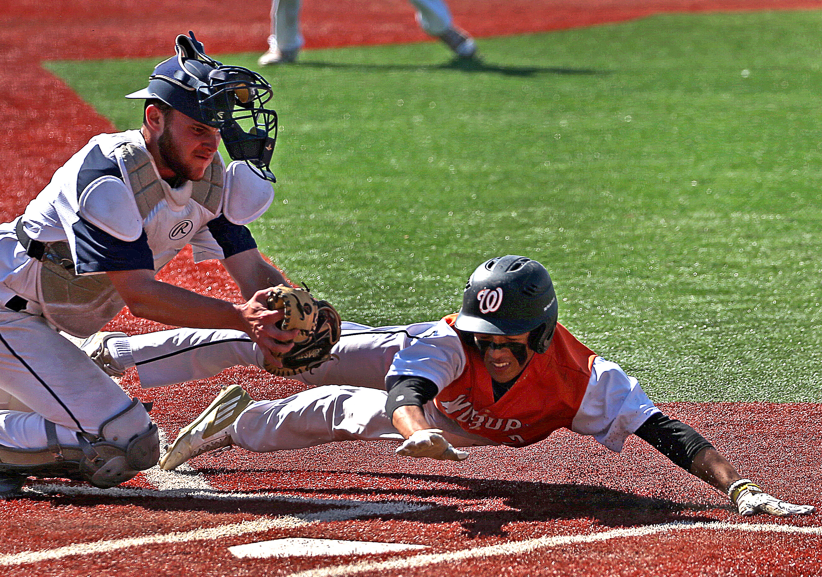 St. Mary’s (Lynn) catcher John Mulready tagged out Woburn’s Julian Steed at the plate during St. Mary’s 5-0 win in the Division 2 North final in Lynn on June 15.