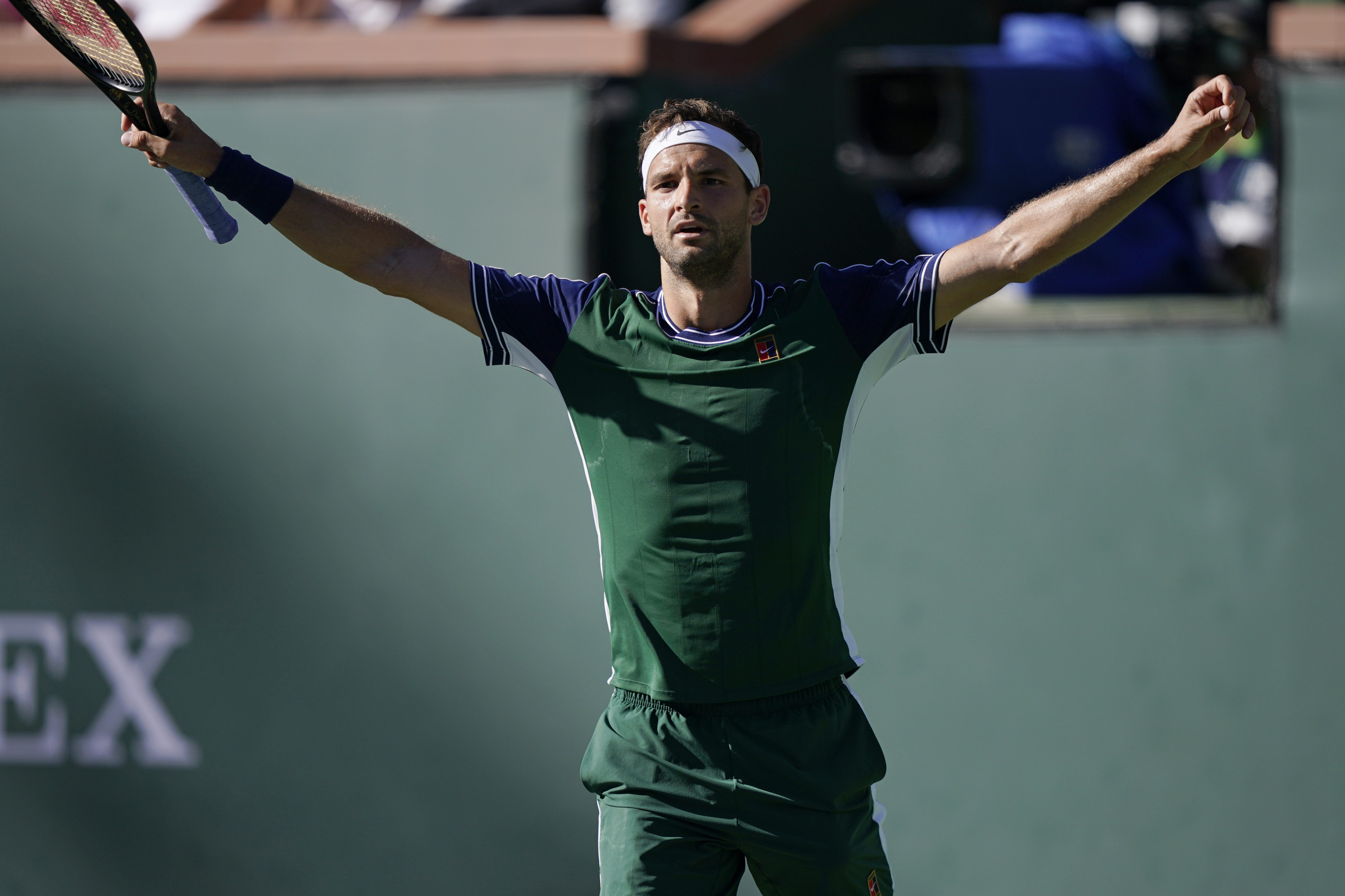 Grigor Dimitrov celebrates his three-set win Wednesday in California.