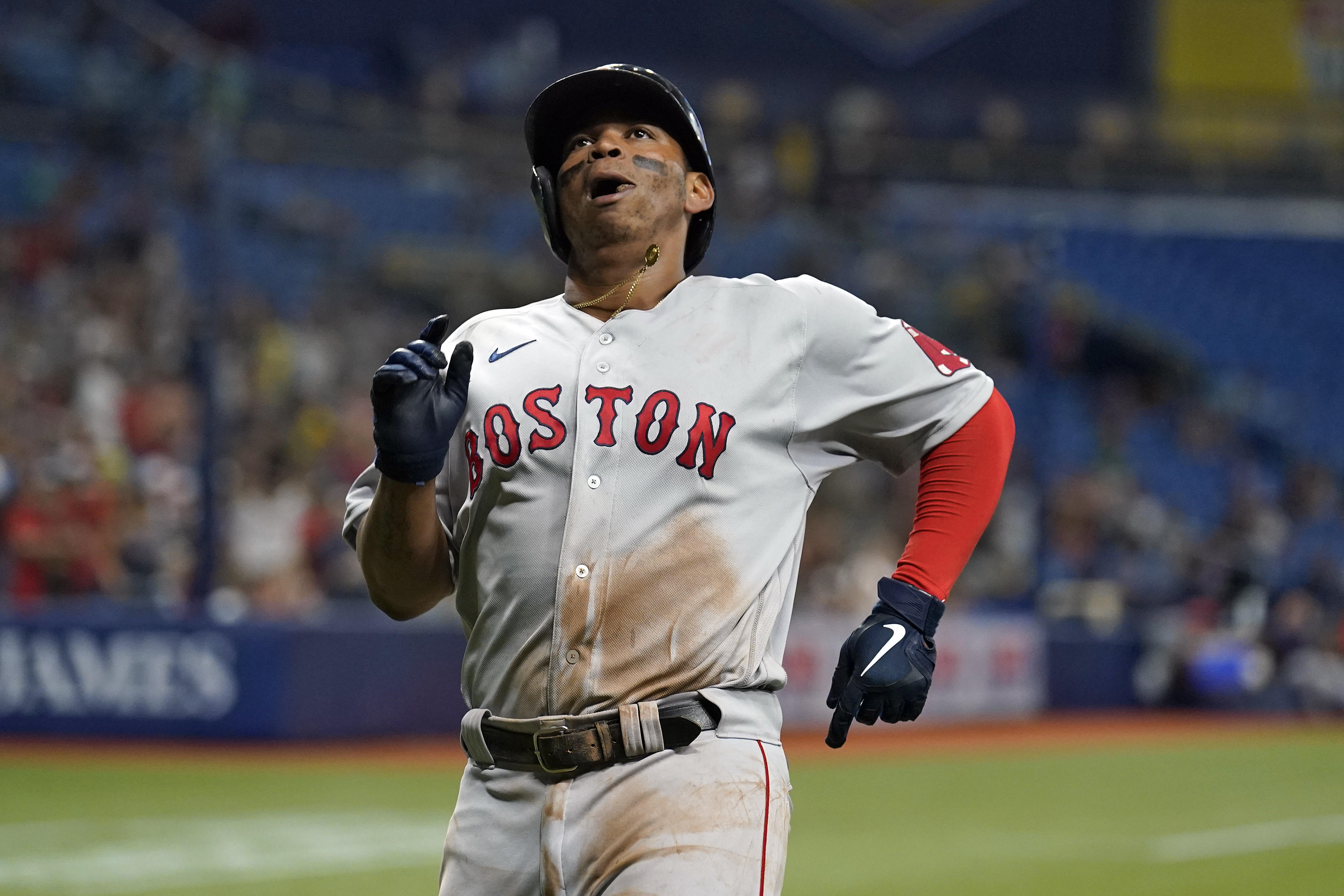 Rafael Devers delivered a key double to lift the Red Sox in the 11th.