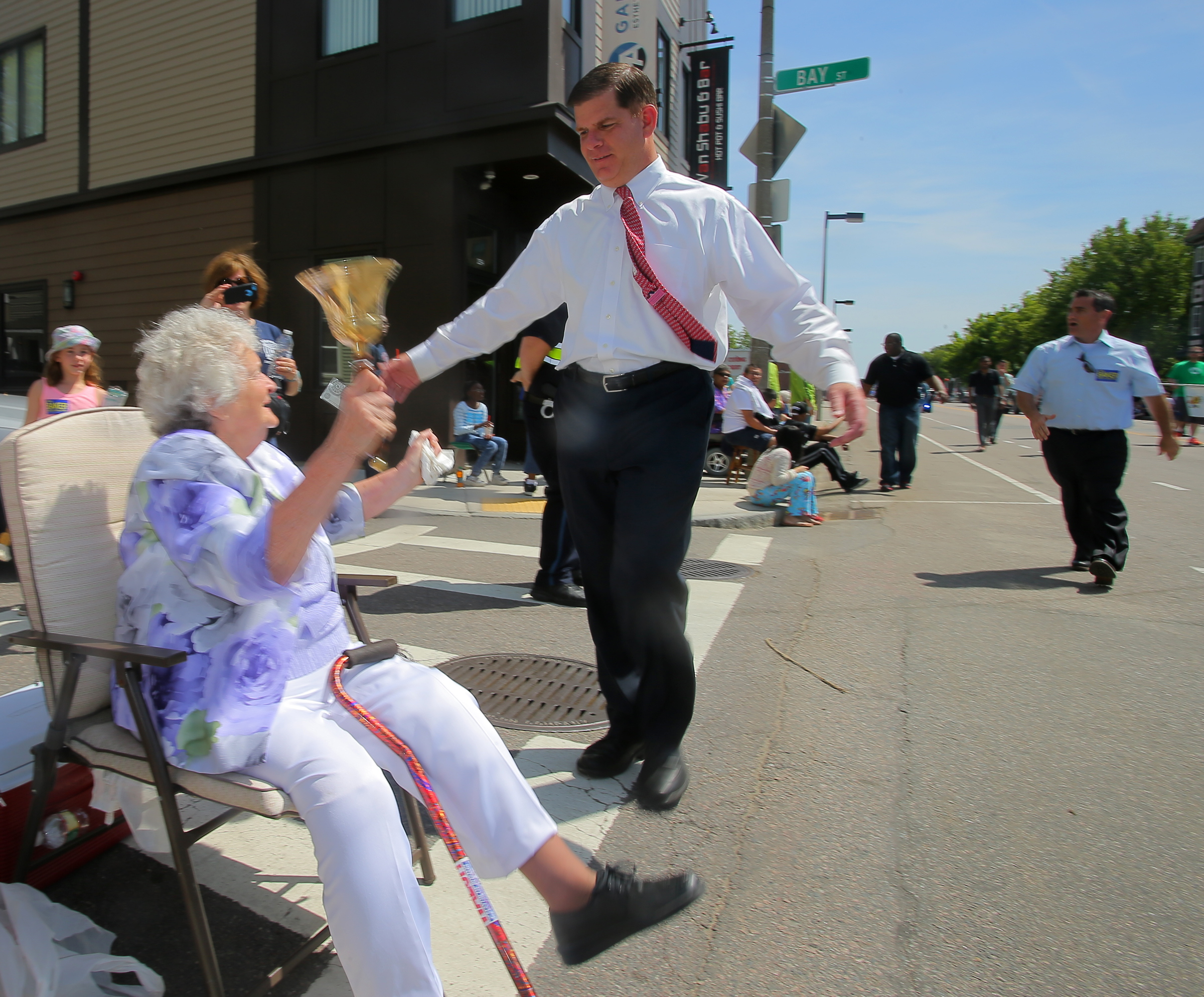 Marty Walsh greets supporter Kay White during the Dorchester Day Parade in June 2014.