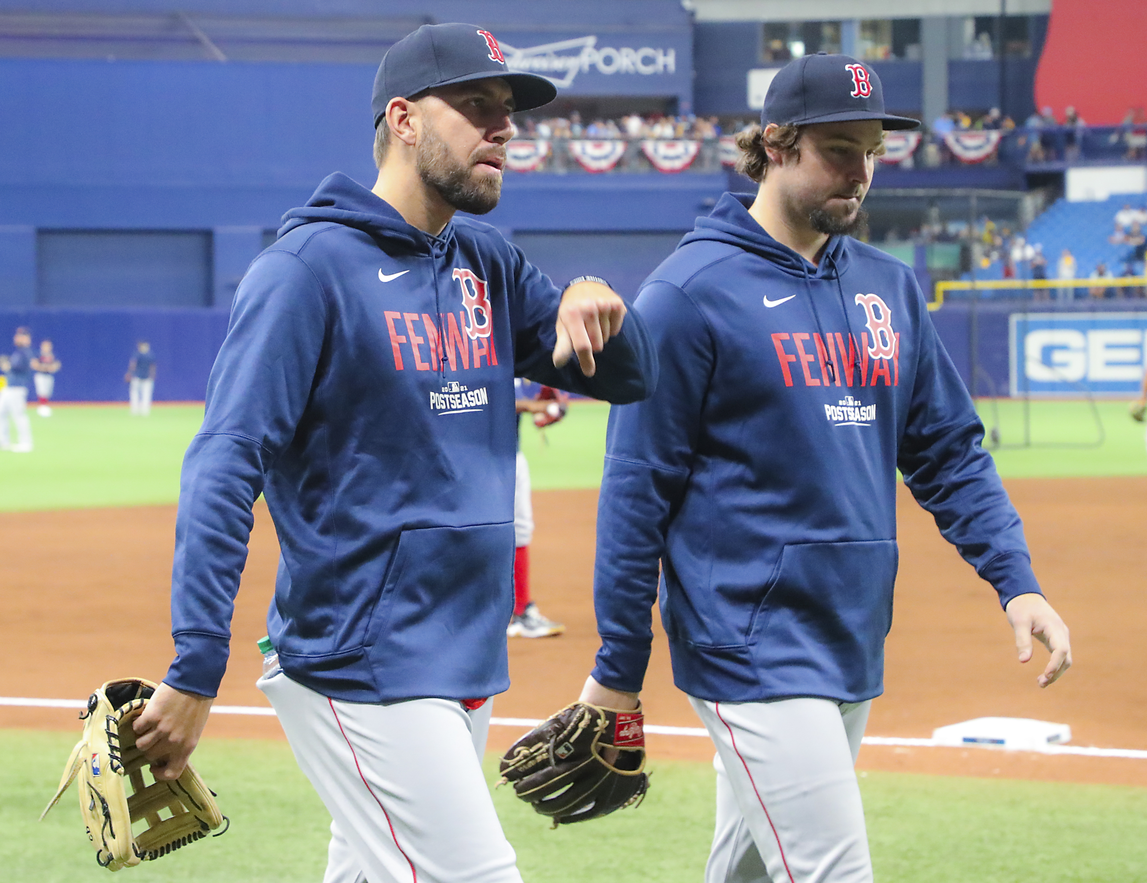 Matt Barnes, left, walks off the field before Game 1 Thursday night.