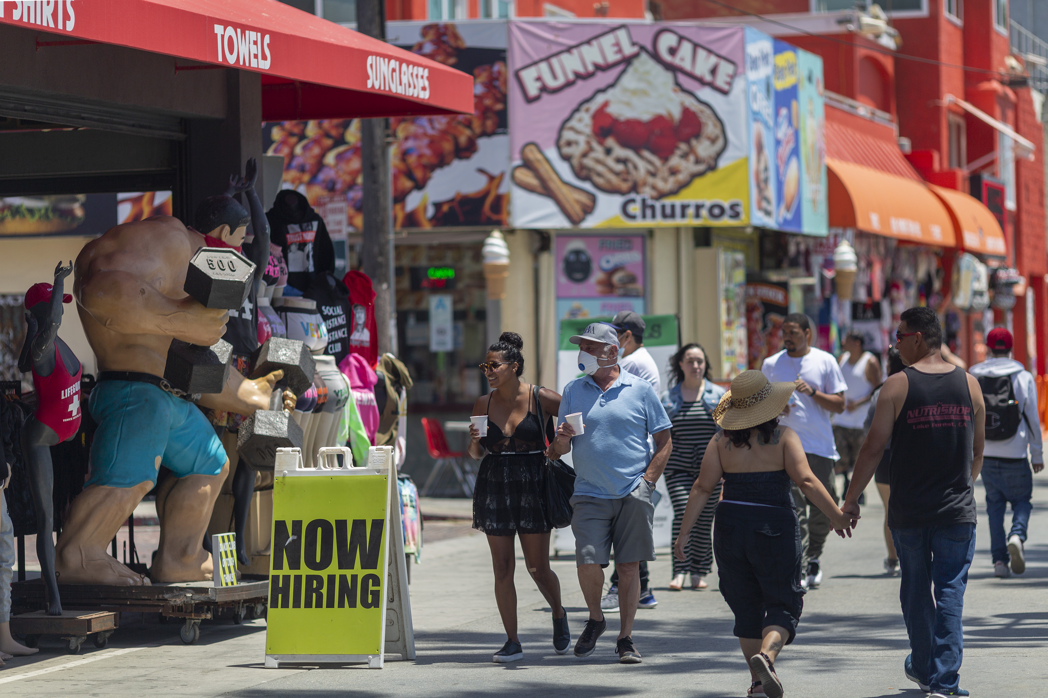 Holiday beachgoers headed to Venice Beach in Los Angeles.