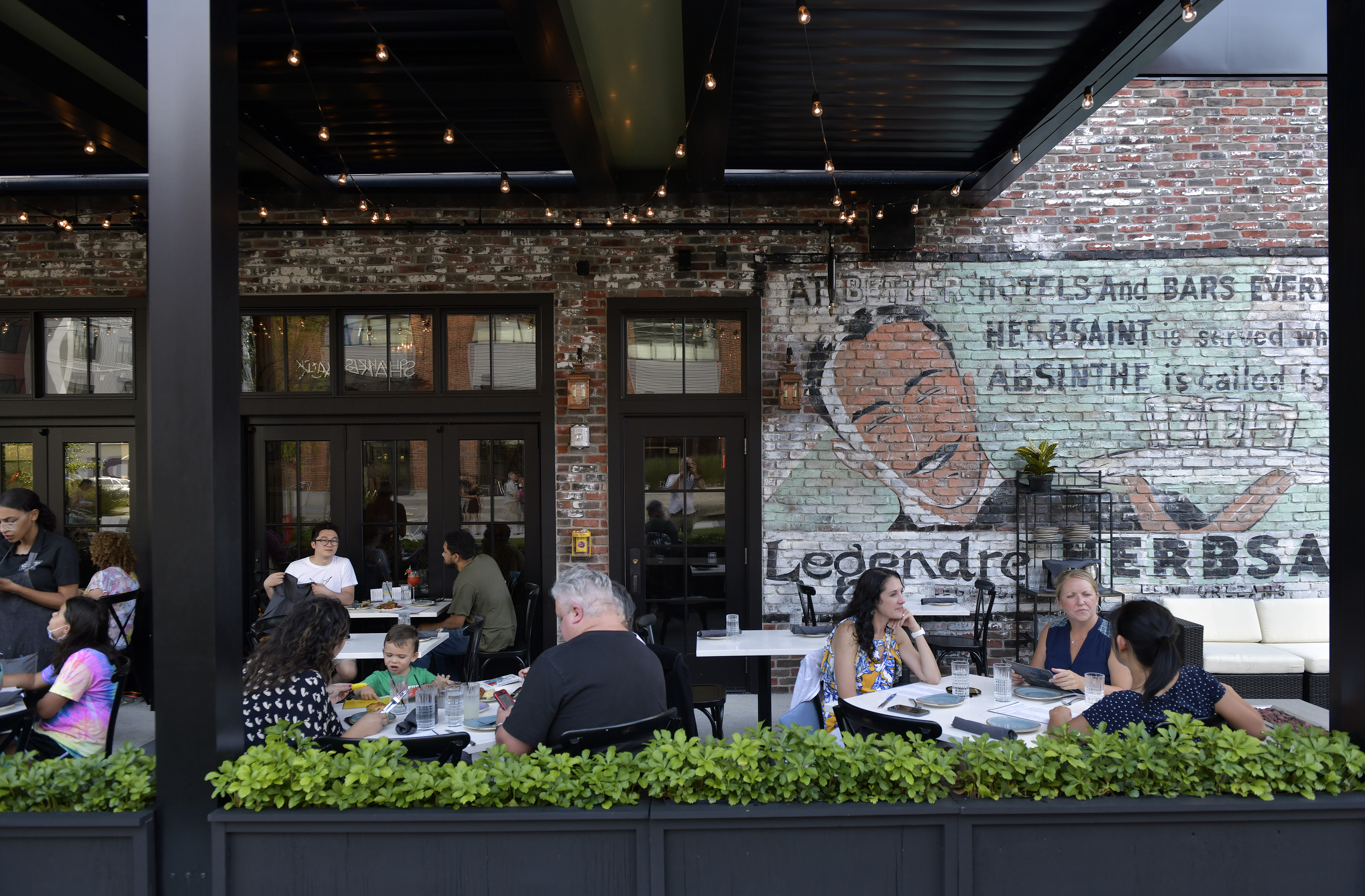 Outdoor seating at Chef Jason Santos's new Buttermilk & Bourbon location at Arsenal Yards in Watertown.