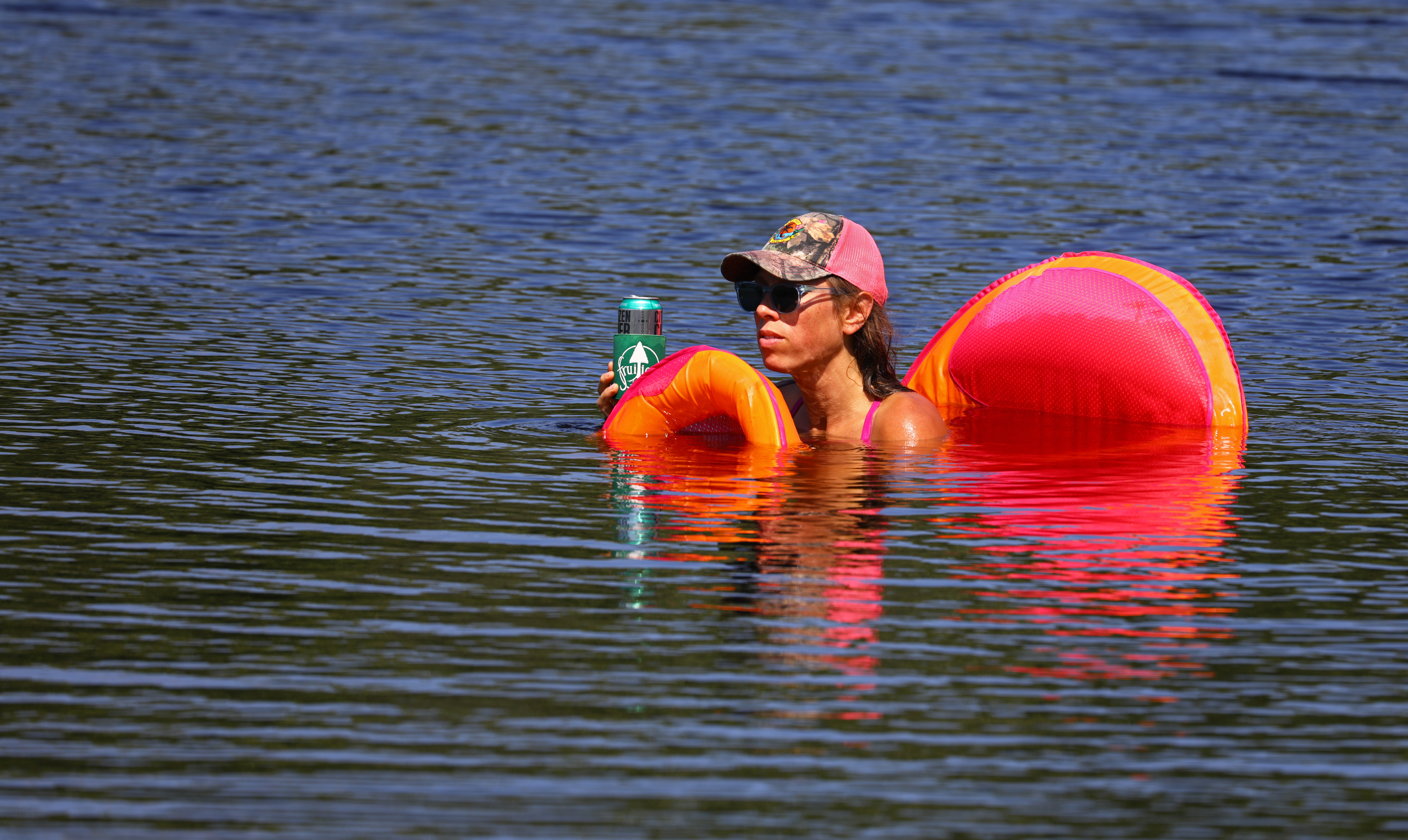 Visitors continue to ignore "No Swimming" signs at Turtle Pond, which were put up following a recent drowning. Authorities shouldn’t let those signs be substitutes for lifeguards.