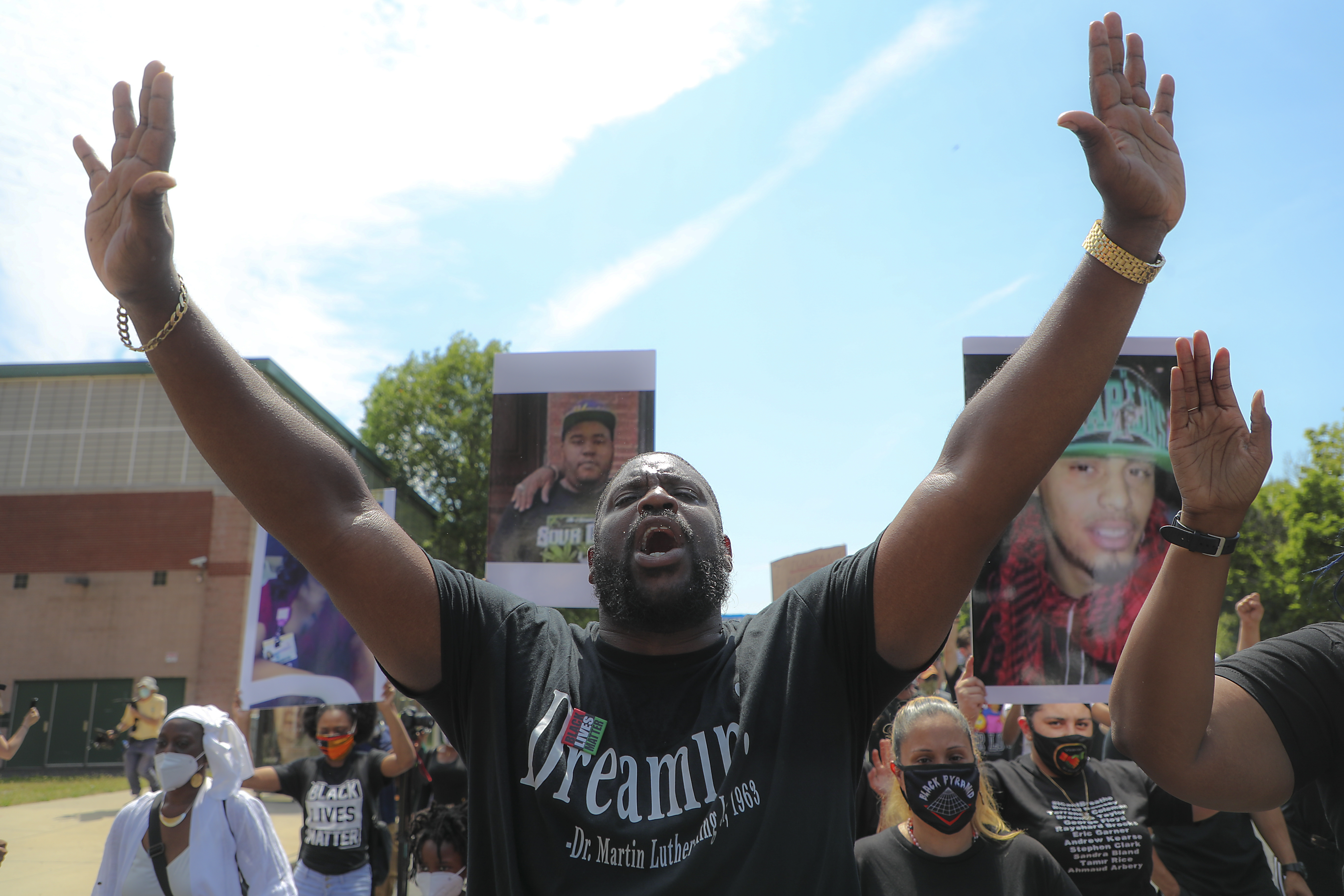 Ricky Grant Jr. chanted “Hands Up! Don’t Shoot!” during the protest and march.