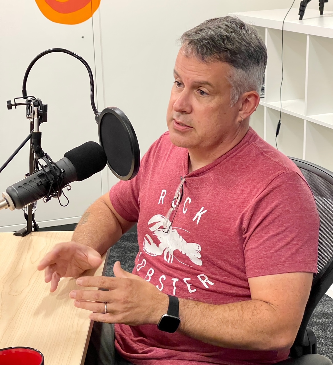 Brown University professor Baylor Fox-Kemper speaks to Boston Globe reporter Brian Amaral during the recording of a Rhode Island Report podcast.