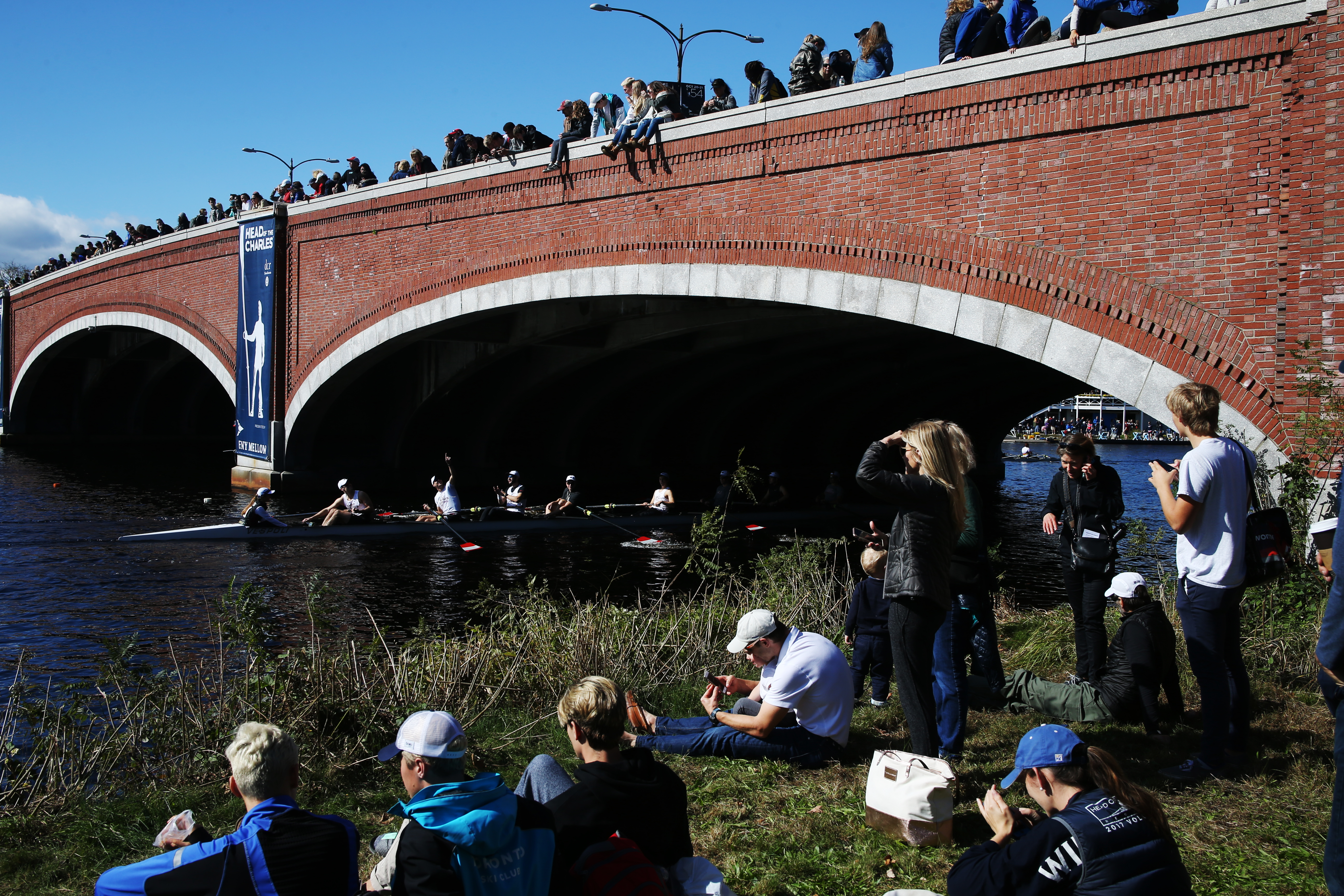 Crowds gather at Eliot Bridge to watch the 2018 Head of the Charles.