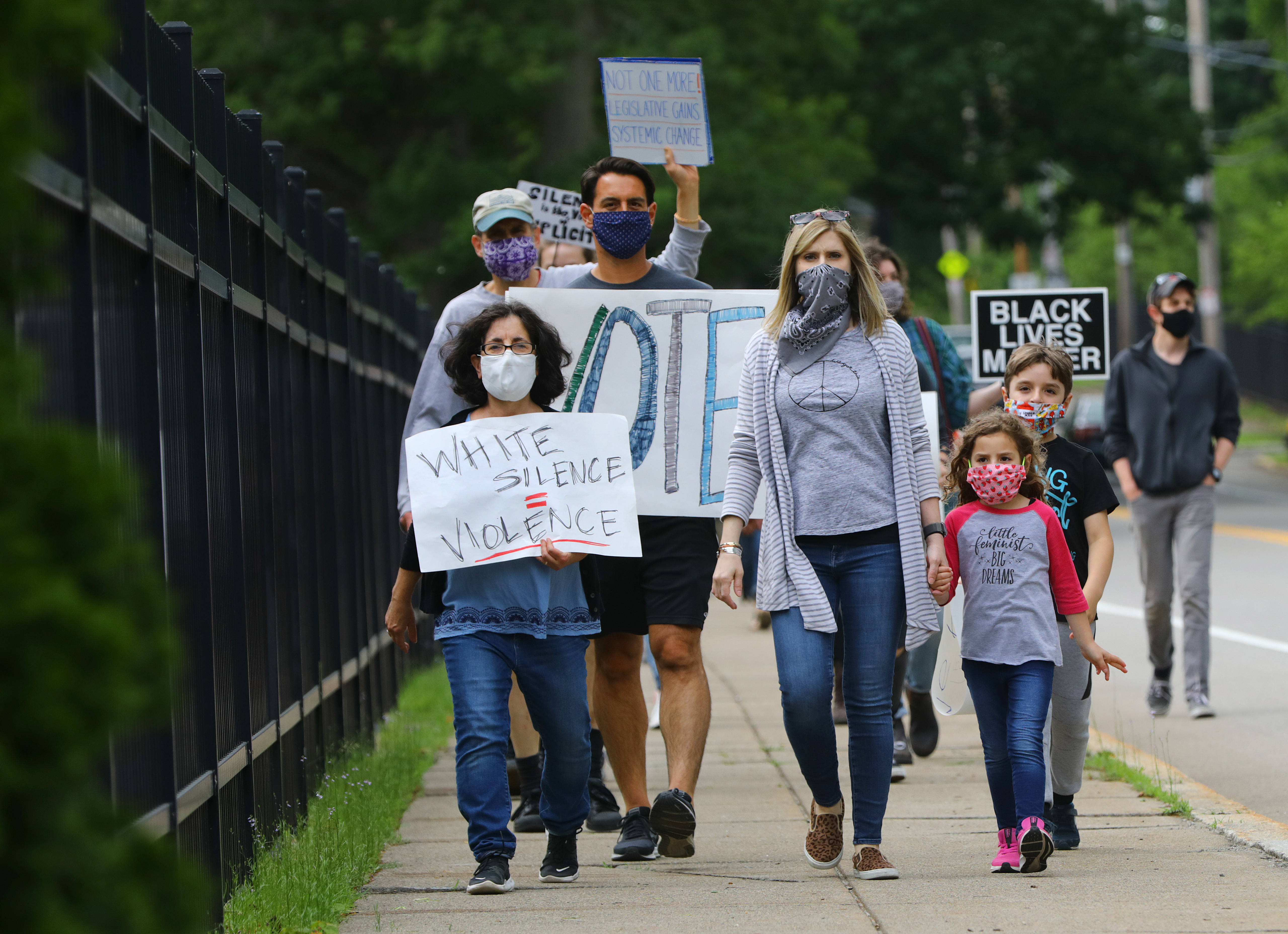 Protesters marched down Walk Hill Street.