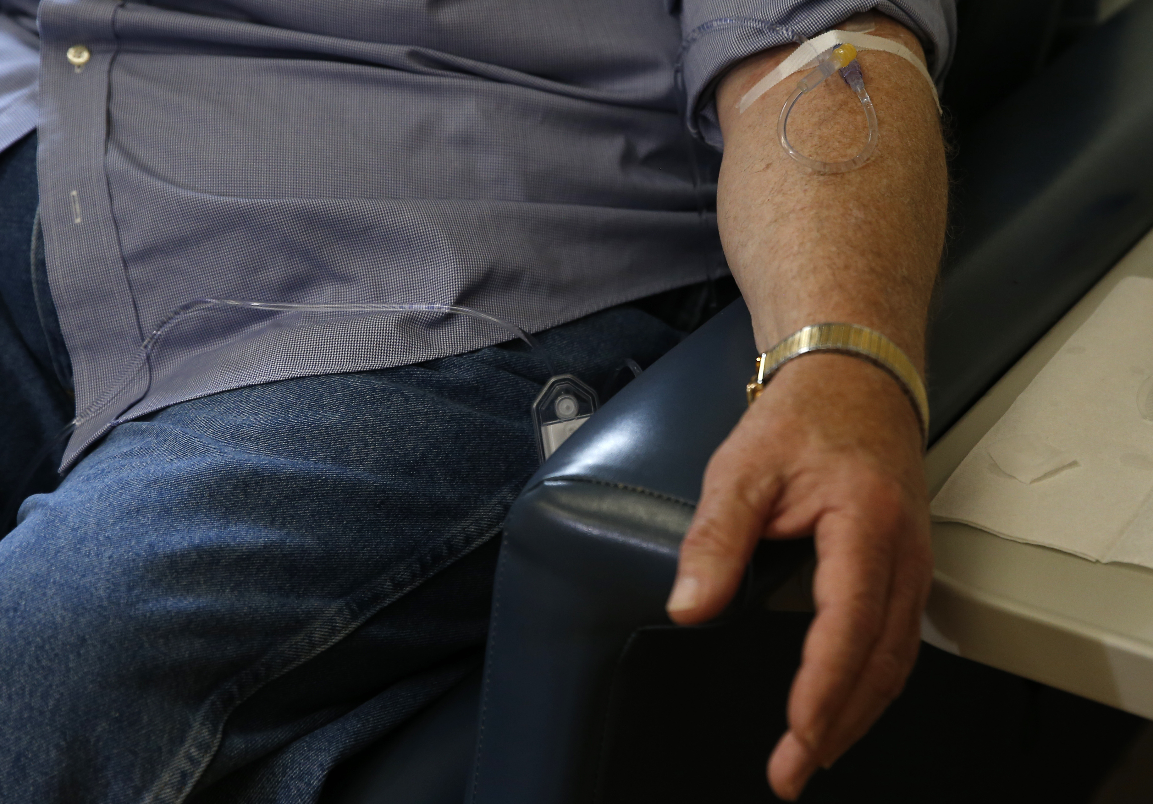 Marc Archambault, a 70-year-old resident of South Kingstown, RI, sat in a blue recliner chair during the hour-long infusion.