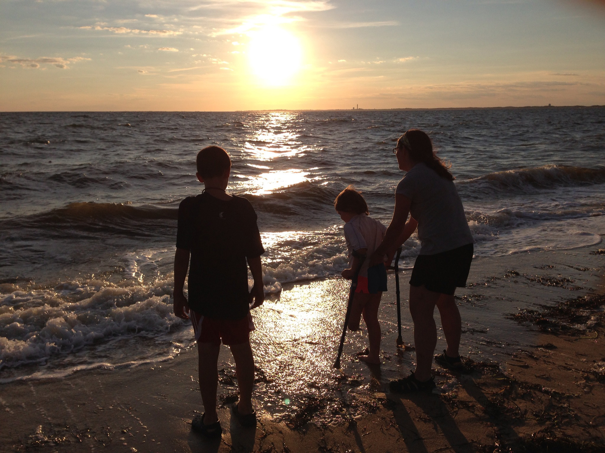 A CHANGE OF PLACE AND PACE: The Richards walked along Truro’s shore in August. The summer routine, often a trip to New Hampshire, took on a different meaning without Martin. They needed new memories.