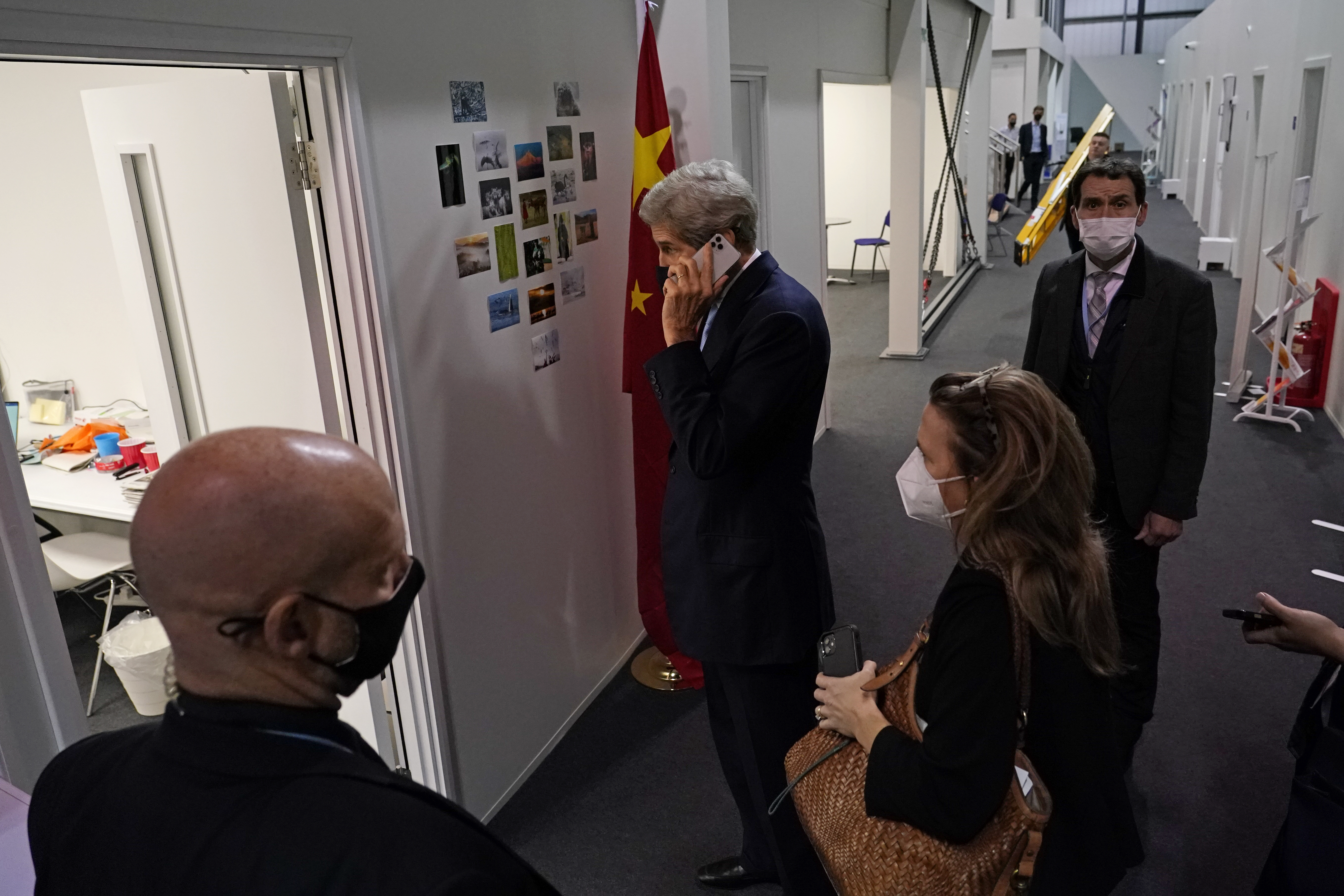 Kerry waited outside the Chinese delegation office in Glasgow.