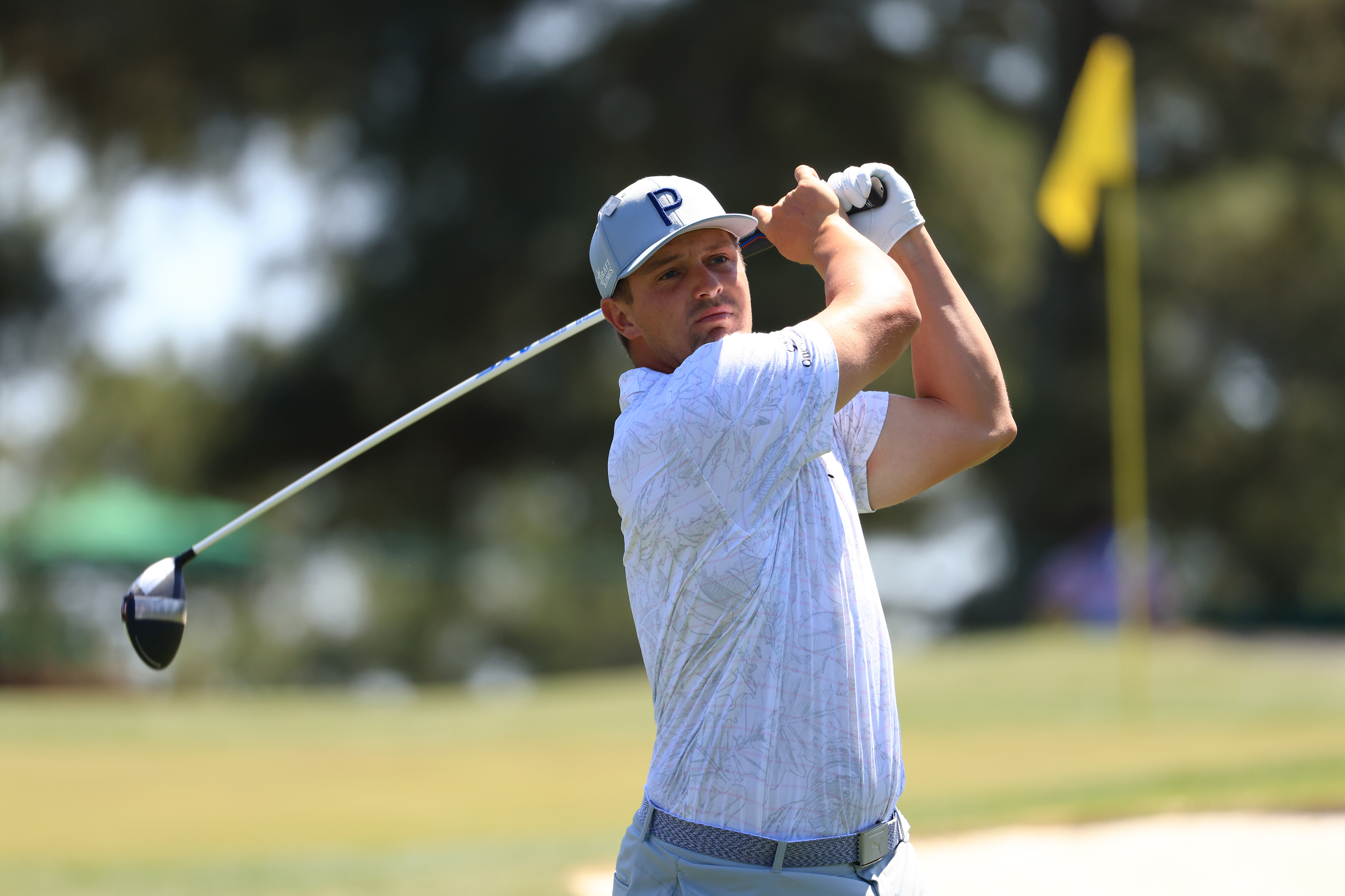 Bryson DeChambeau plays his shot from the third tee during a practice round Tuesday.