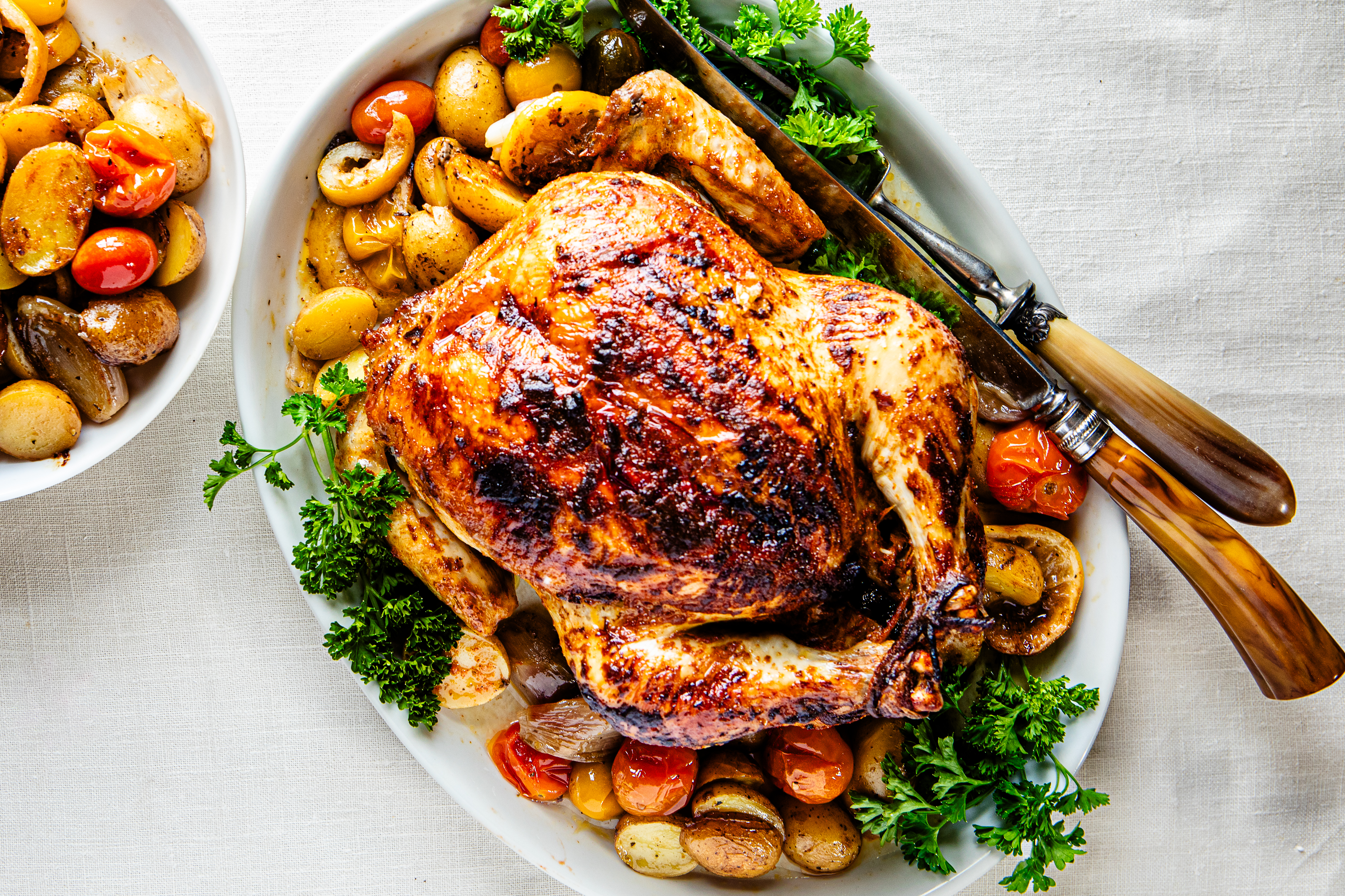 Whole Roast Chicken with Potatoes and Cherry Tomatoes