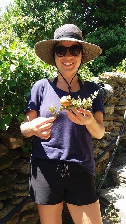 Lena Tashjian with a pomegranate in Greece.