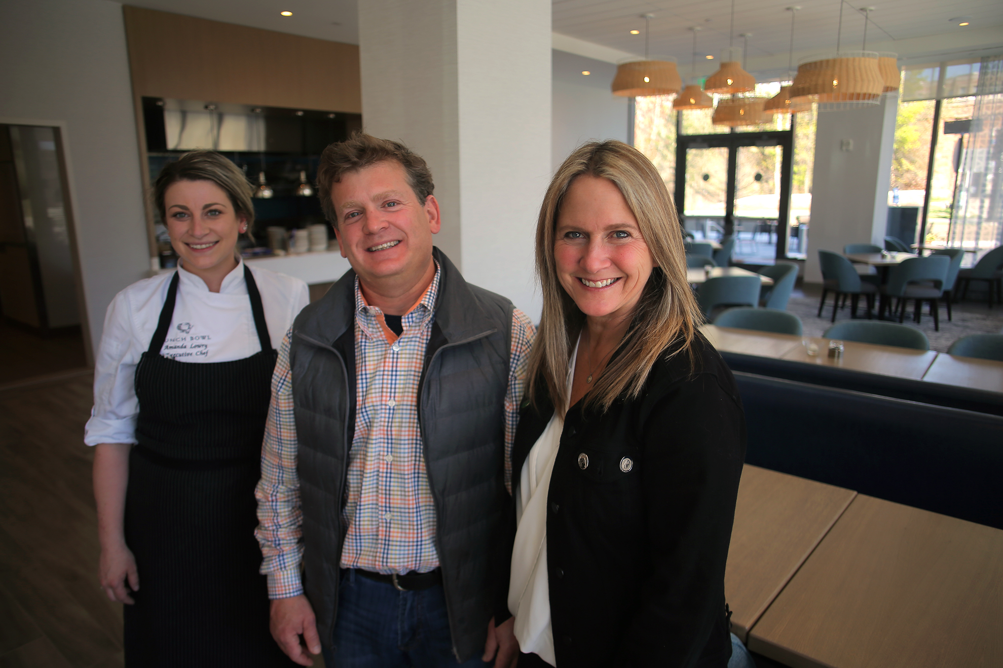 Restaurateurs Jen and Josh Ziskin and executive chef Amanda Lowry at the Punch Bowl restaurant in the new Hilton Garden Inn in Brookline Village.