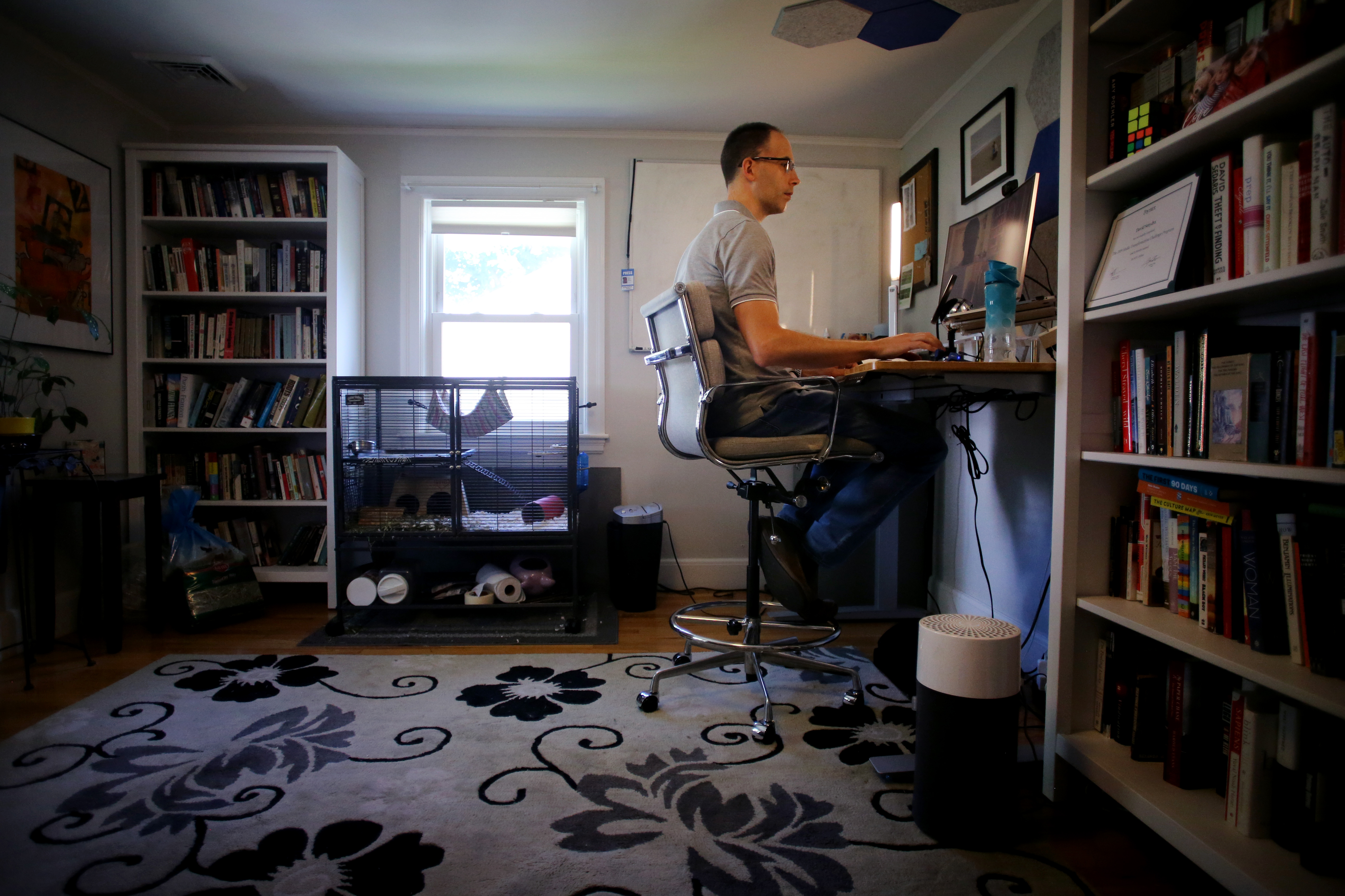 David Smydra worked in his home office in West Roxbury.