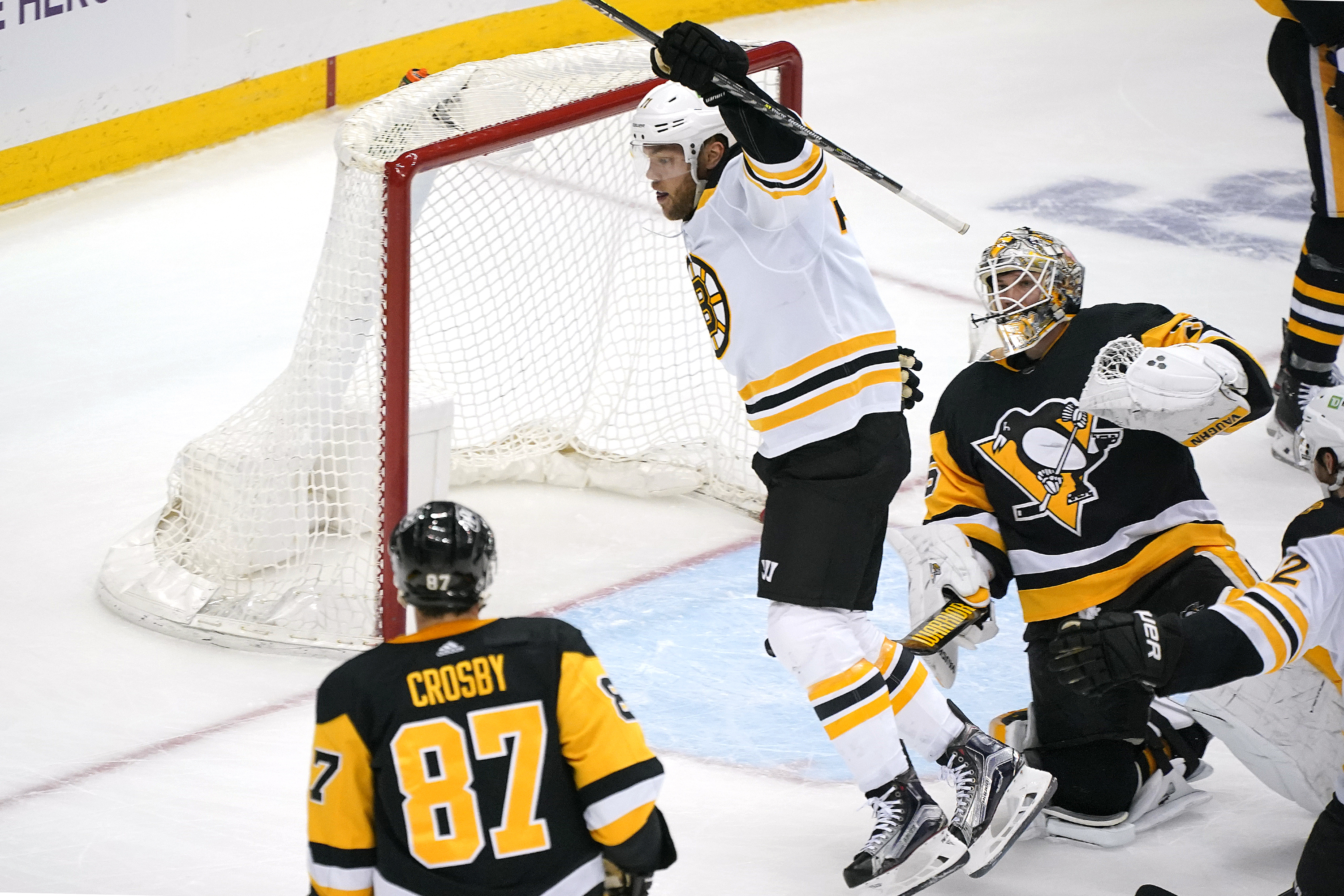 Taylor Hall celebrates his third-period goal that cemented the win for the Bruins.