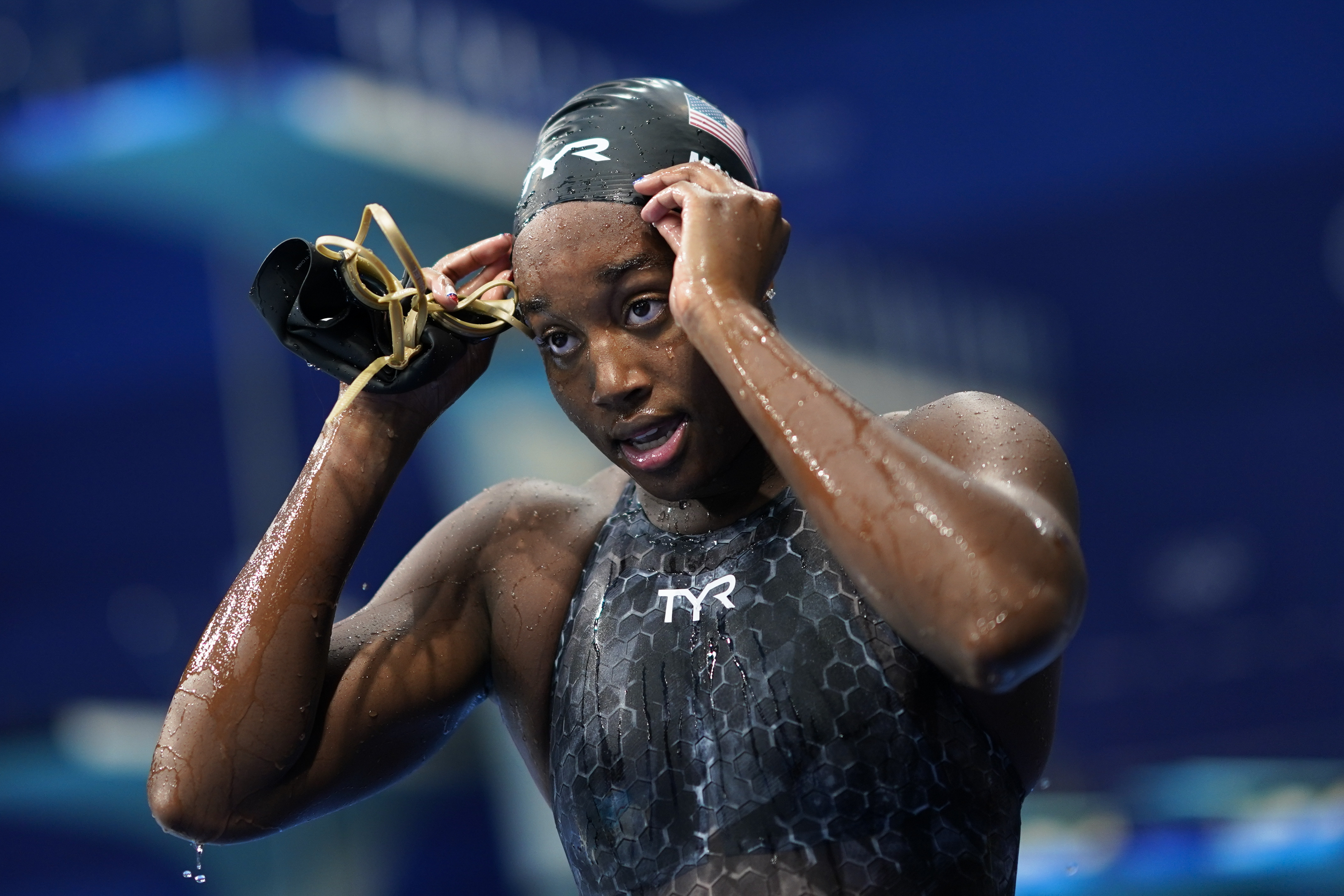 Simone Manuel leaves the pool Saturday after failing to qualify for the finals in the women's 50-meter freestyle.