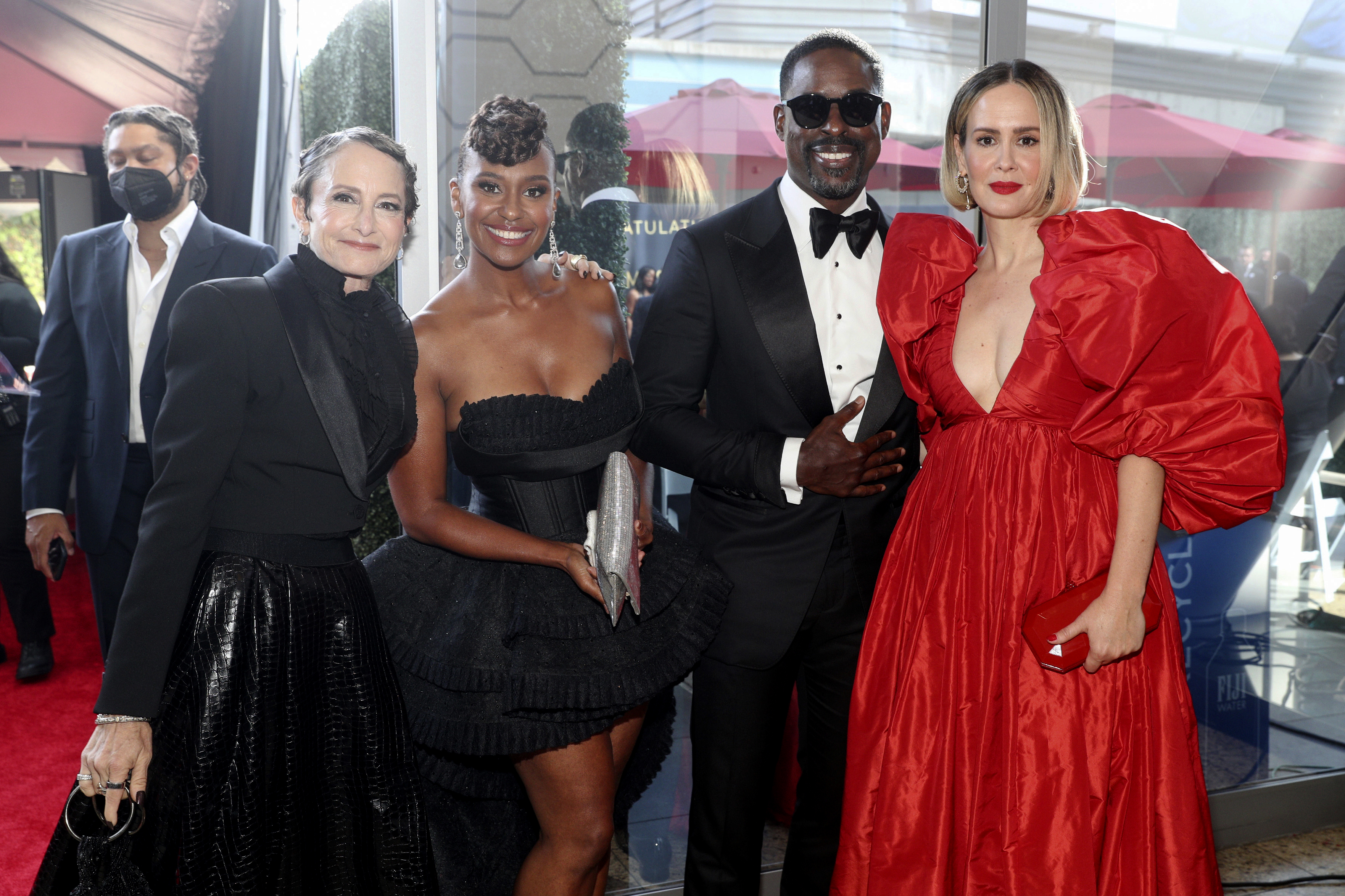 Ryan Michelle Bathe (second from left) Sterling K. Brown, and Sarah Paulson (right).
