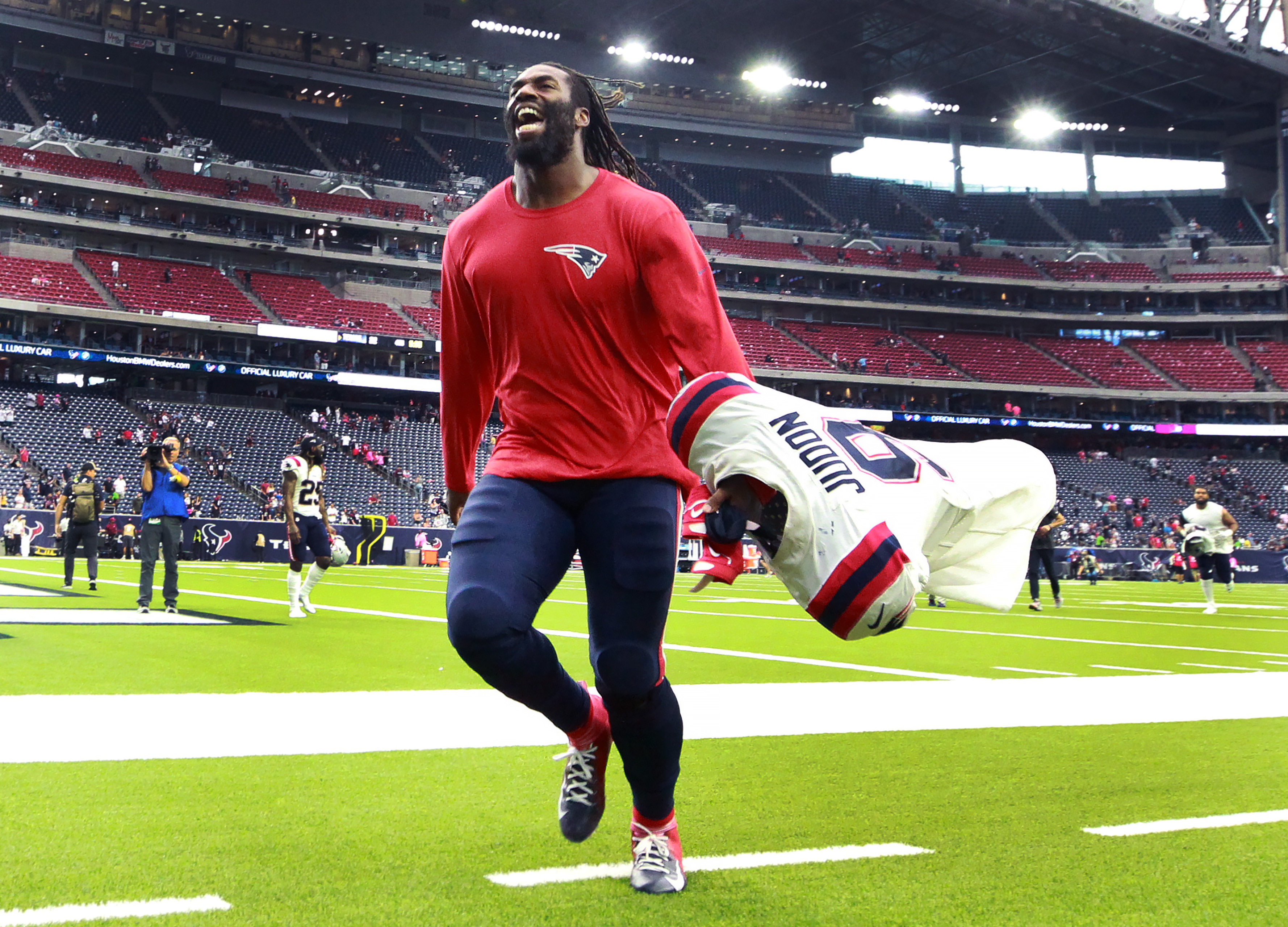 Matt Judon howls with delight as he leaves the field following Sunday's 25-22 win over Houston.