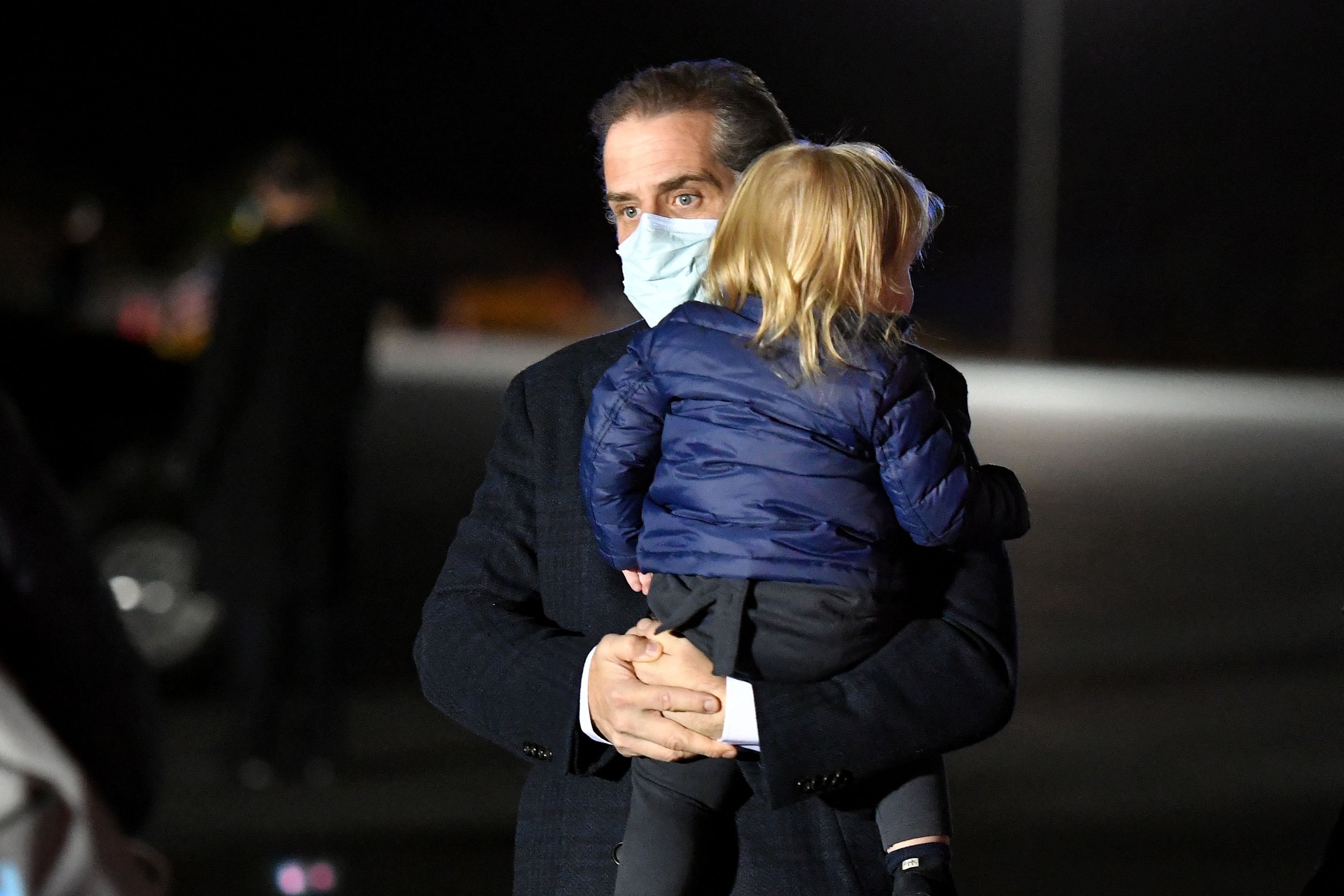 Hunter Biden, son of President Biden is seen on the tarmac after stepping off Air Force One upon arrival at Nantucket Memorial Airport in Nantucket on Nov. 23, 2021.