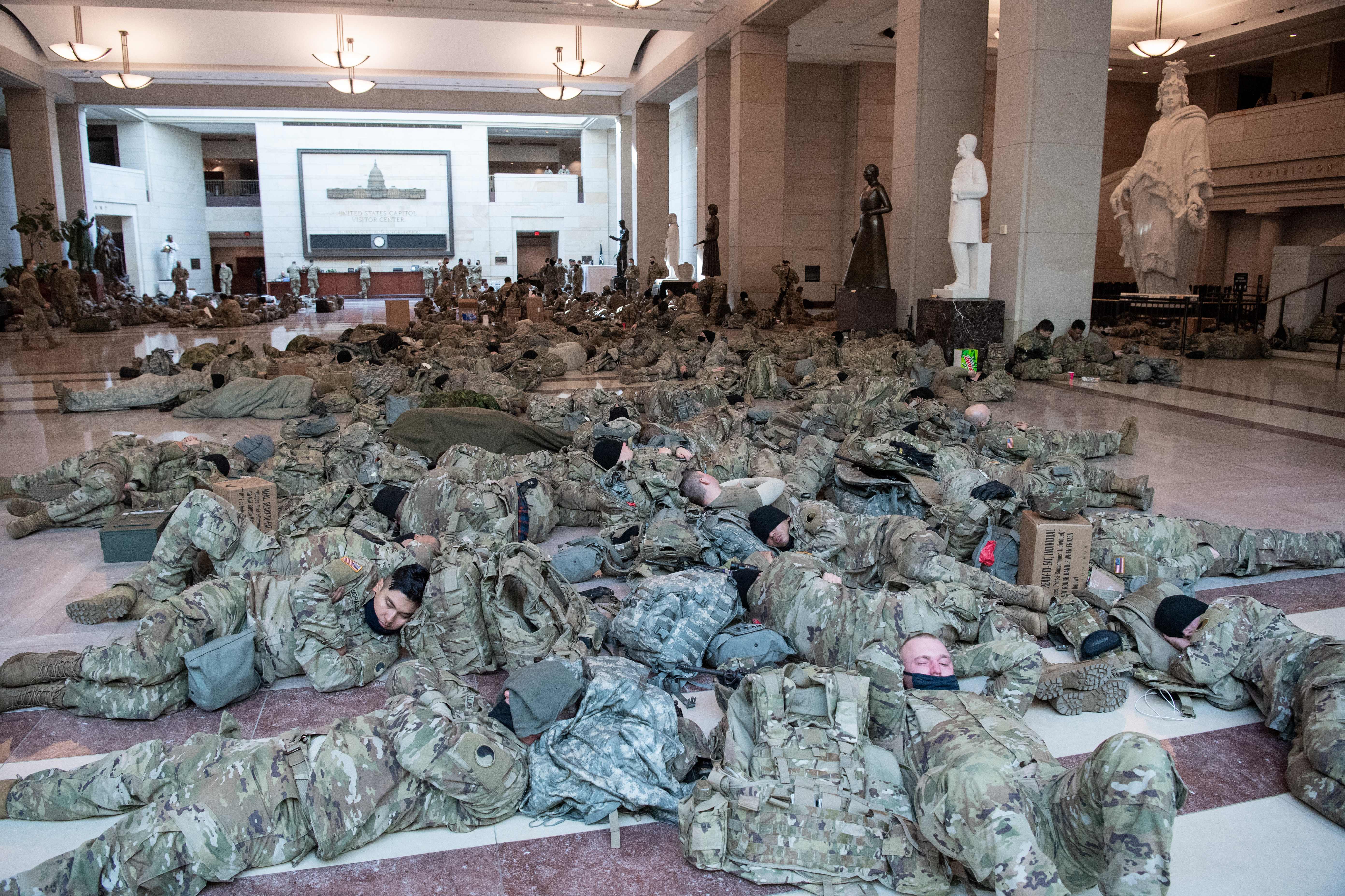 Members of the National Guard rested in the Capitol Visitors Center on Capitol Hill.