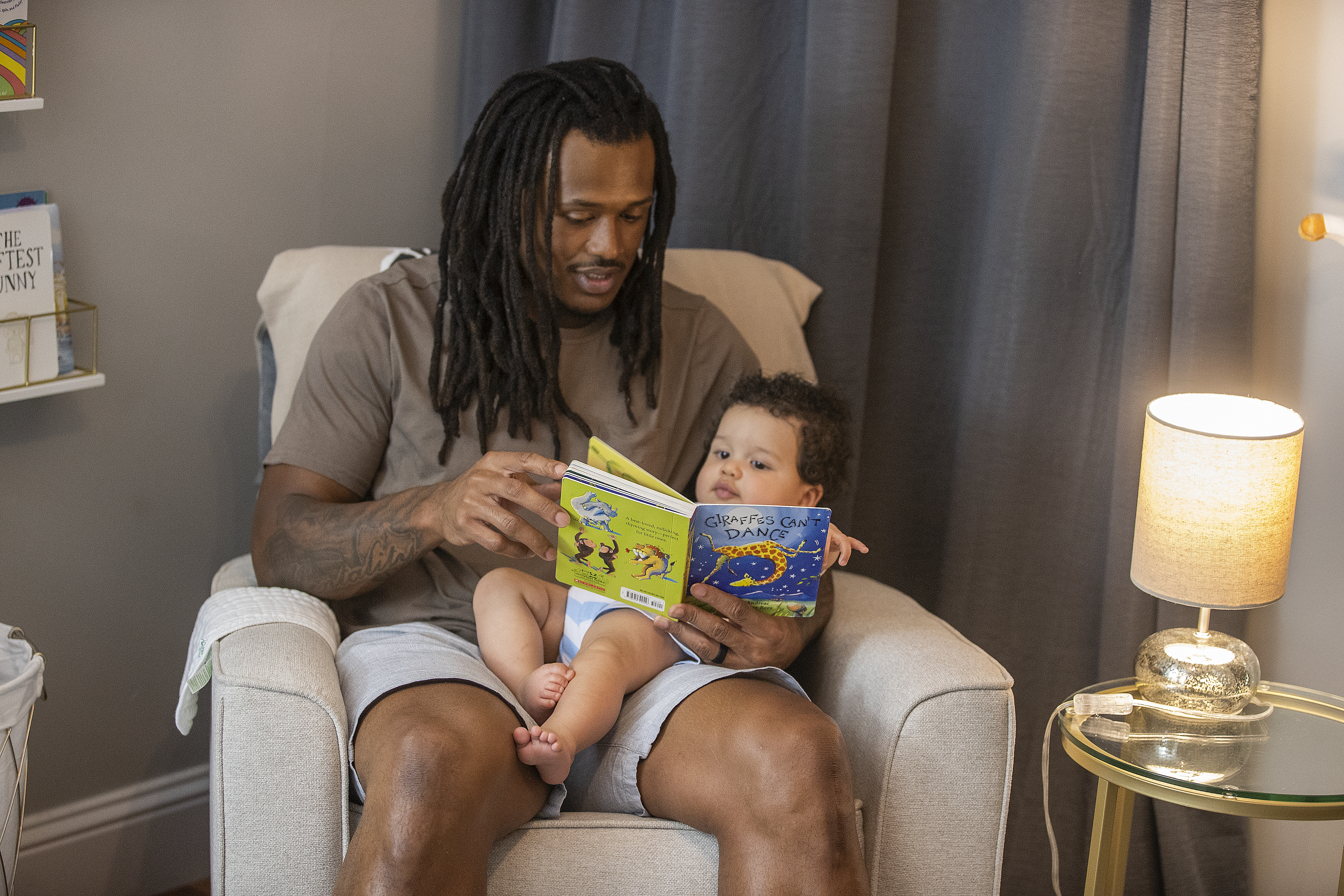 Dad reads Grayson a bedtime story.