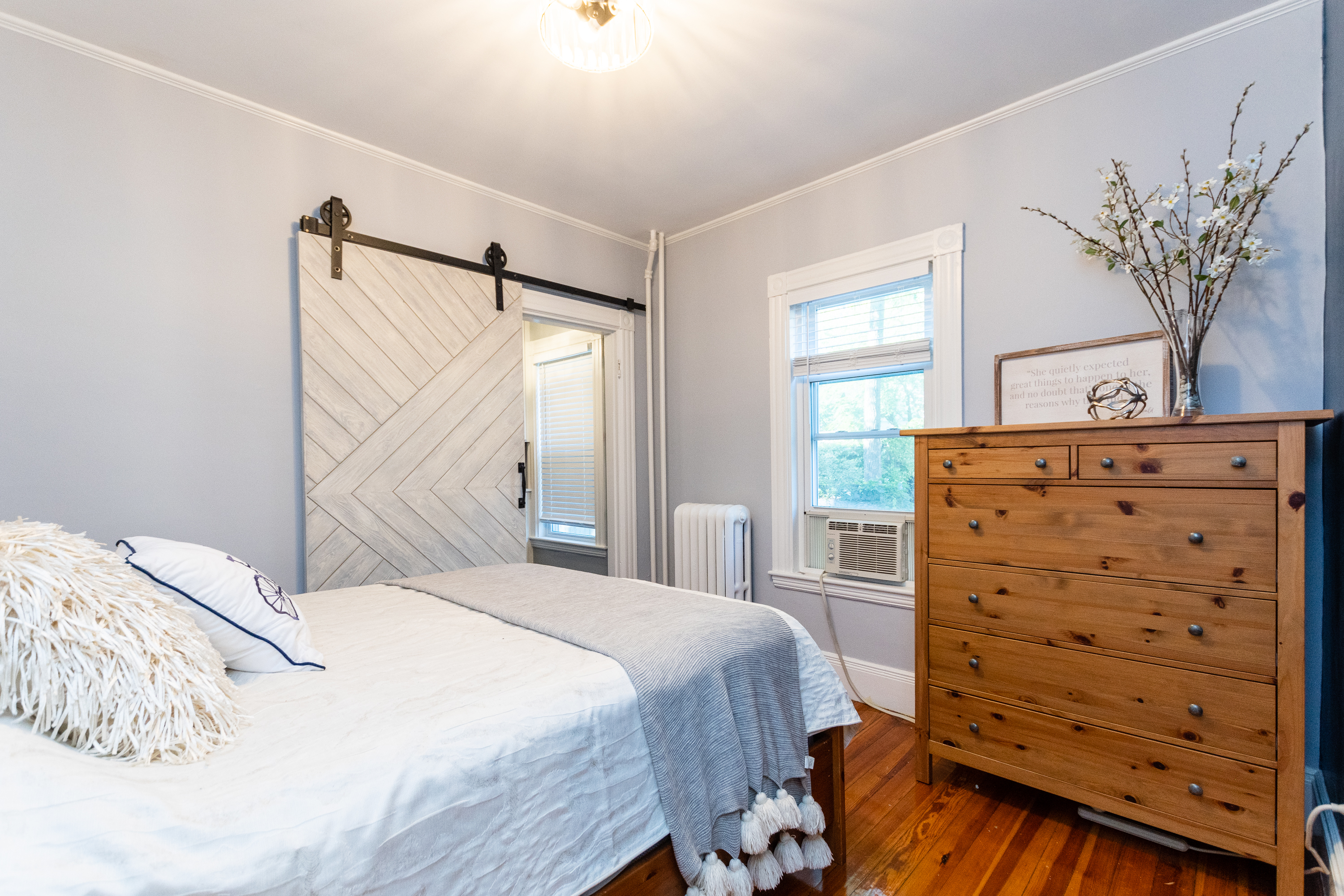 A sliding barn door in one of the bedrooms at 70 Oxford Avenue, Belmont.