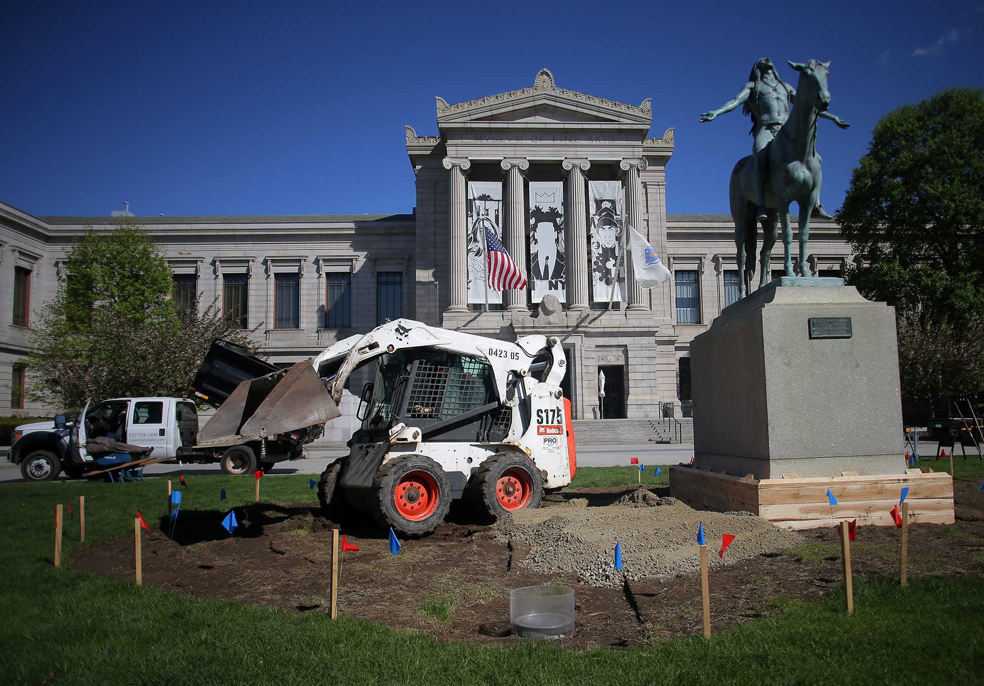 A Bobcat prepared soil in May outside the Museum of Fine Arts for Elizabeth James-Perry's "Raven Reshapes Boston: A Native Corn Garden at the MFA."