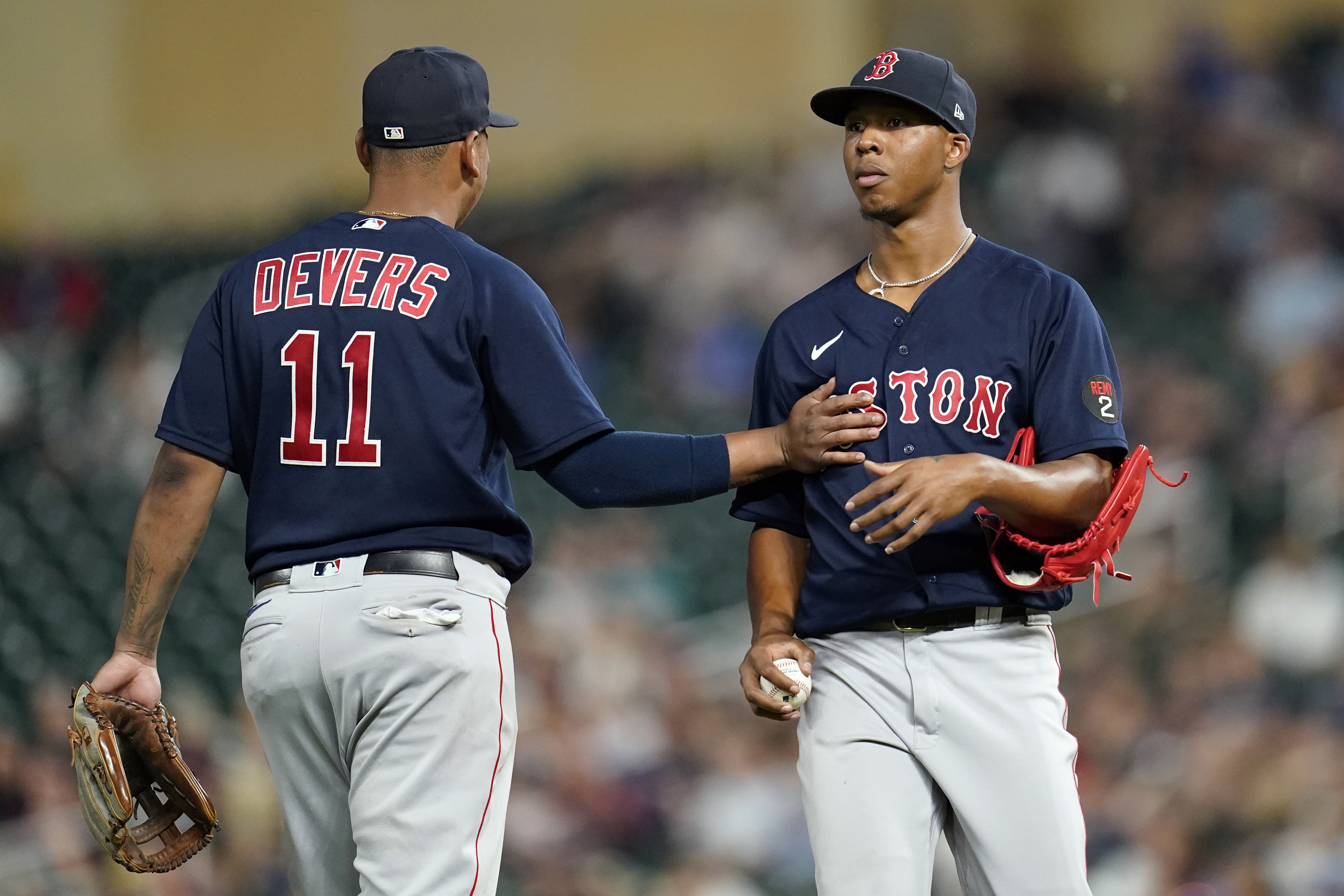 Boston Red Sox, Minnesota Twins open spring with tones festive, somber