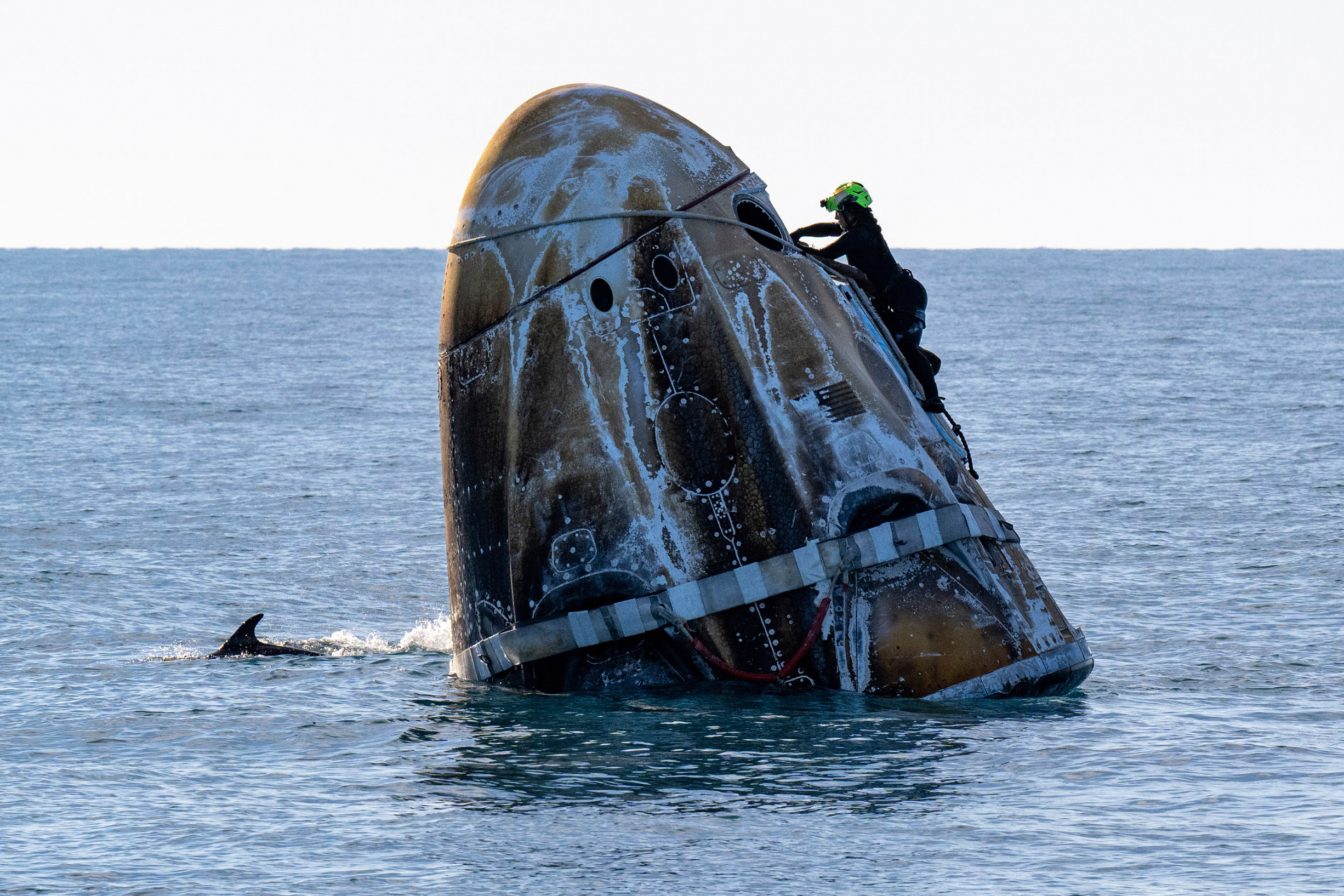 NASA astronauts return to Earth after marathon mission