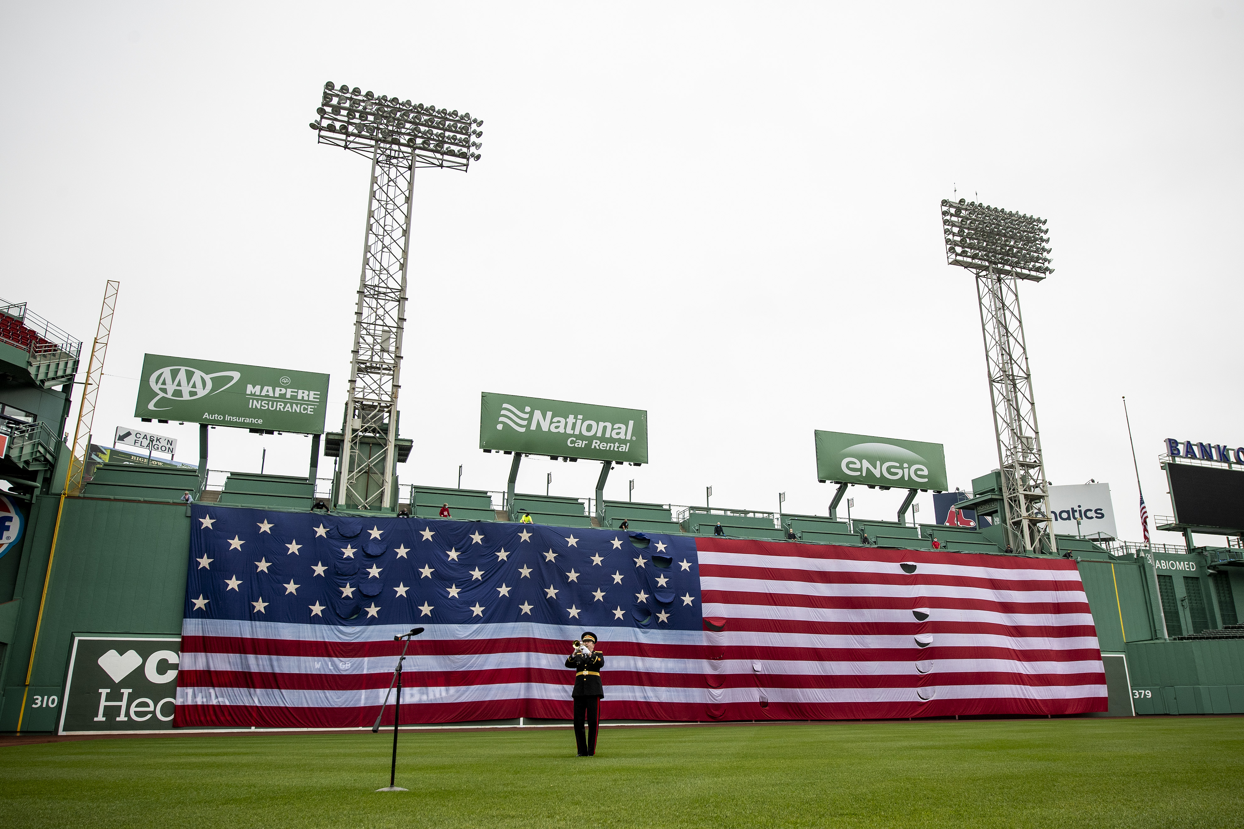 Red Sox Drape American Flag Over Green Monster, Play 'Taps' To Honor  Memorial Day - CBS Boston