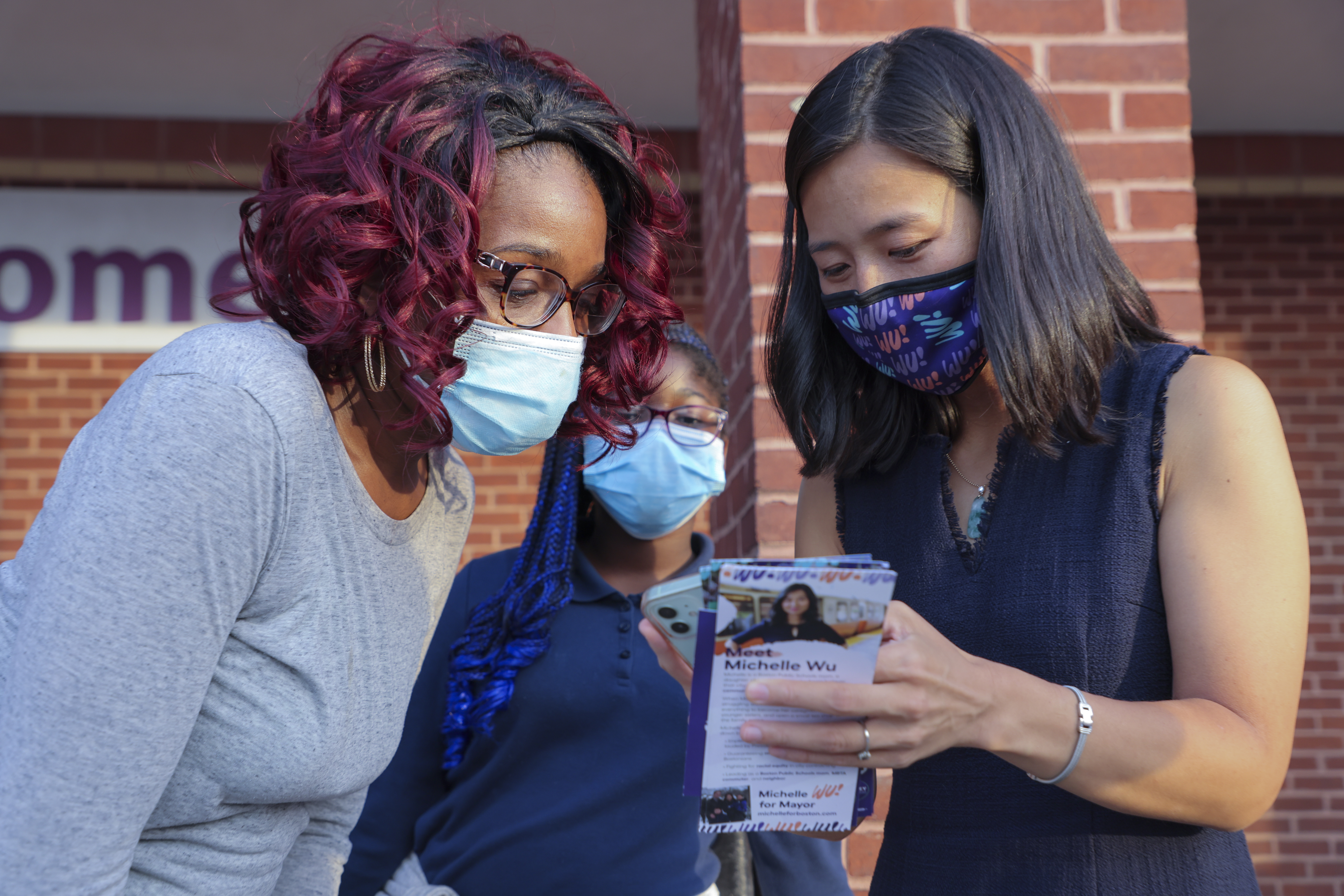 City Councilor Michelle Wu campaigned in Dorchester Monday and met with Carla St. Cyere and her daughter, Taraji.
