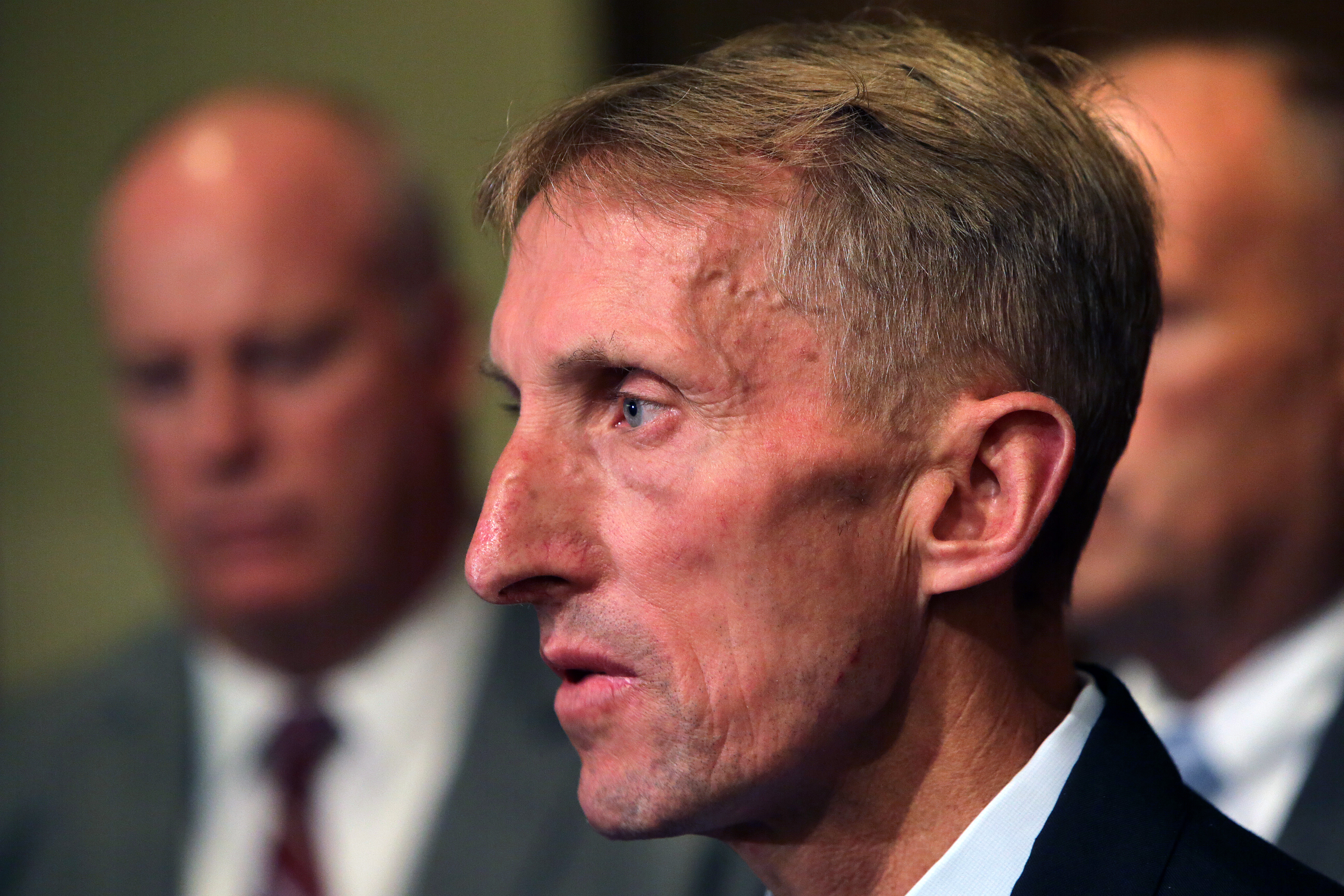 Former Boston police commissioner William B. Evans has said he was not aware of the domestic violence allegations against Dennis White.