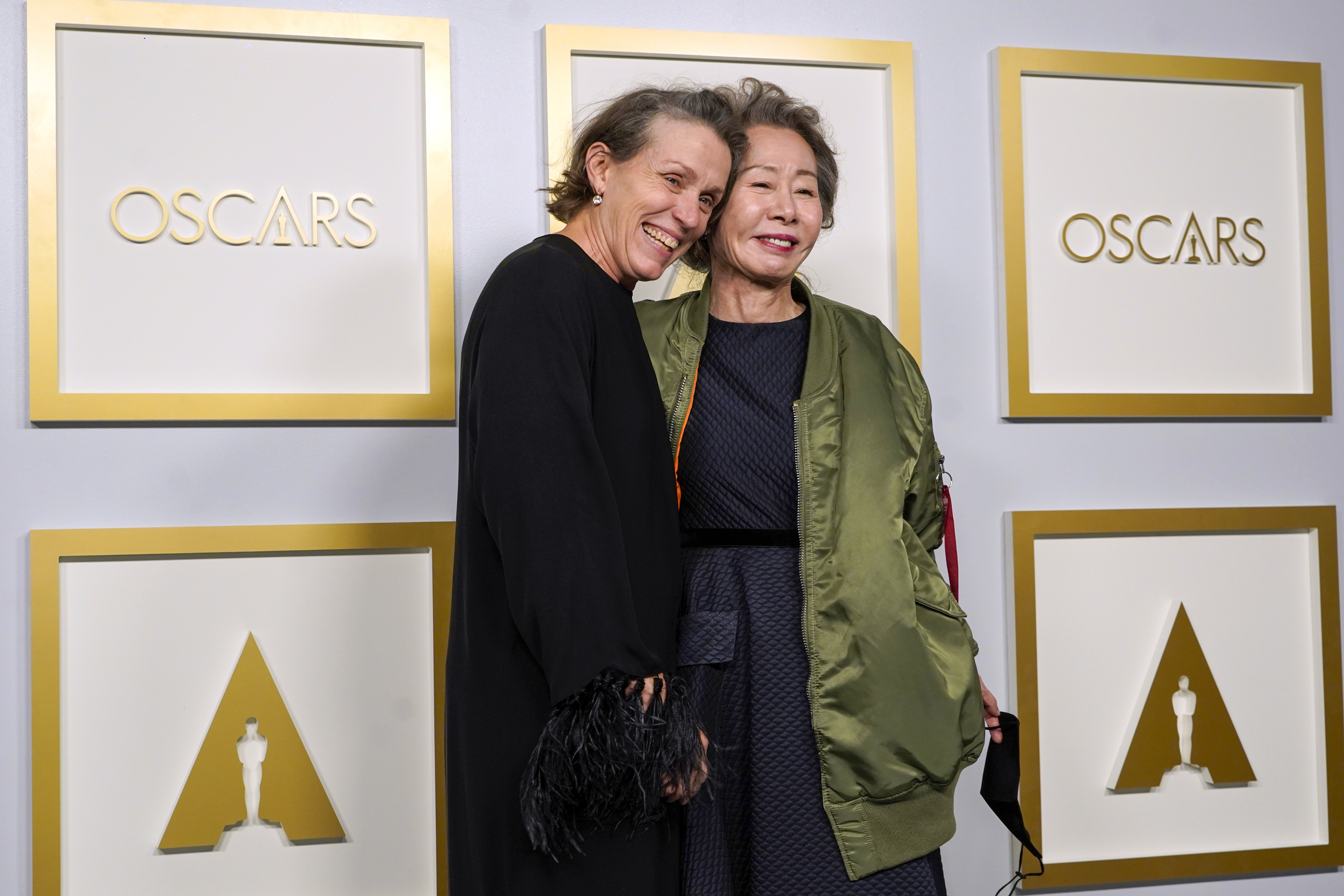 Frances McDormand, winner of this year's best actress Oscar poses in the press room with Yuh-Jung Youn, winner of this year's best supporting actress Oscar.