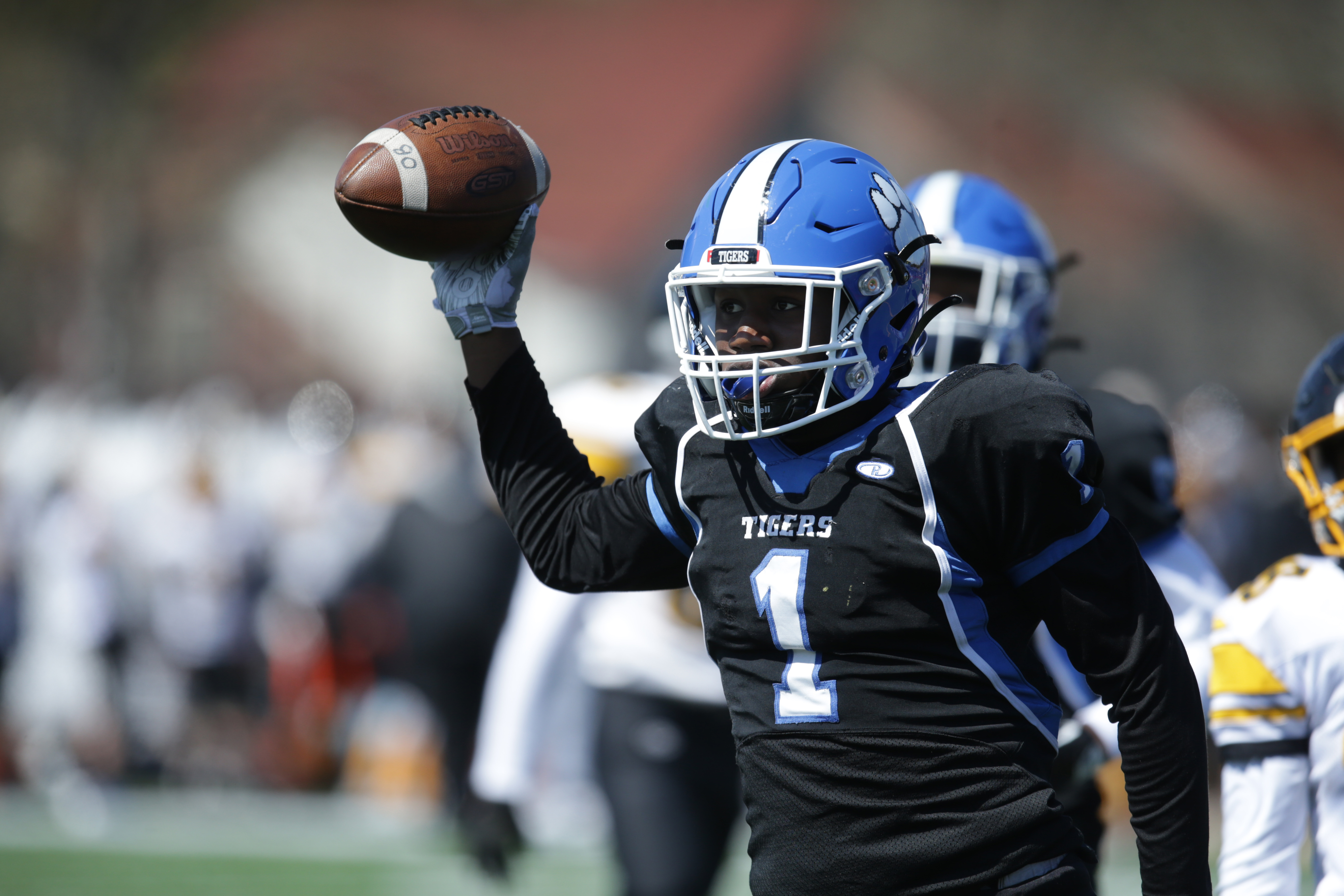 Mohamed Jalloh celebrates his touchdown catch from quarterback Luke Maffeo in the final seconds as O'Bryant rallied past Latin Academy.