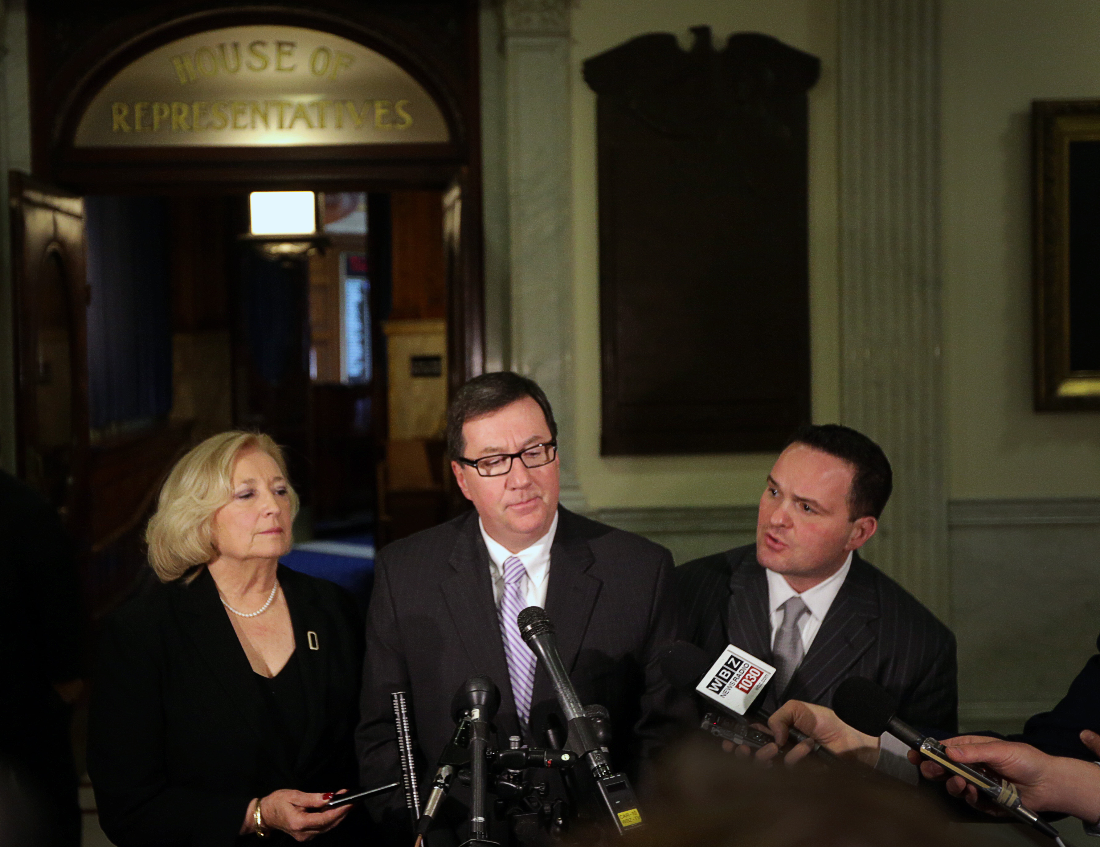Representative Patricia Haddad; Nangle, then the vice chair of the House Committee on Ethics; and Representative Garrett J. Bradley addressed the media in 2014.