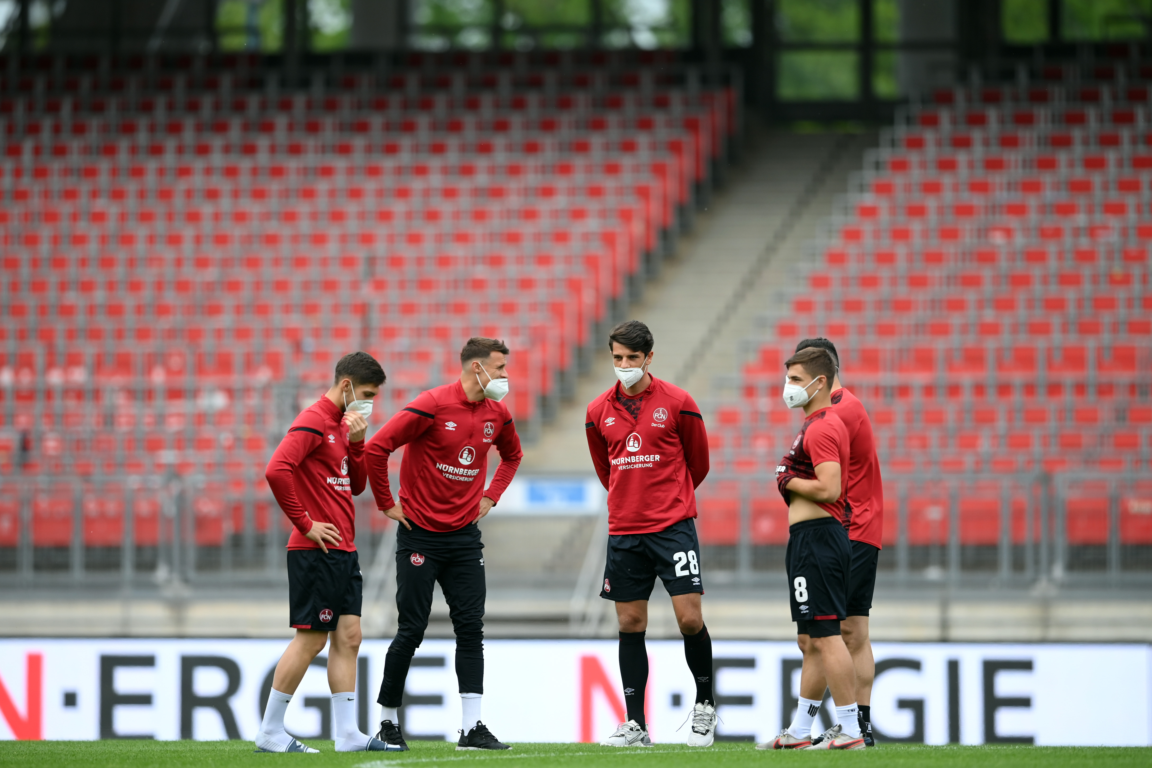 Players in Bundesliga, the German soccer league, have been playing real games with no fans this month.